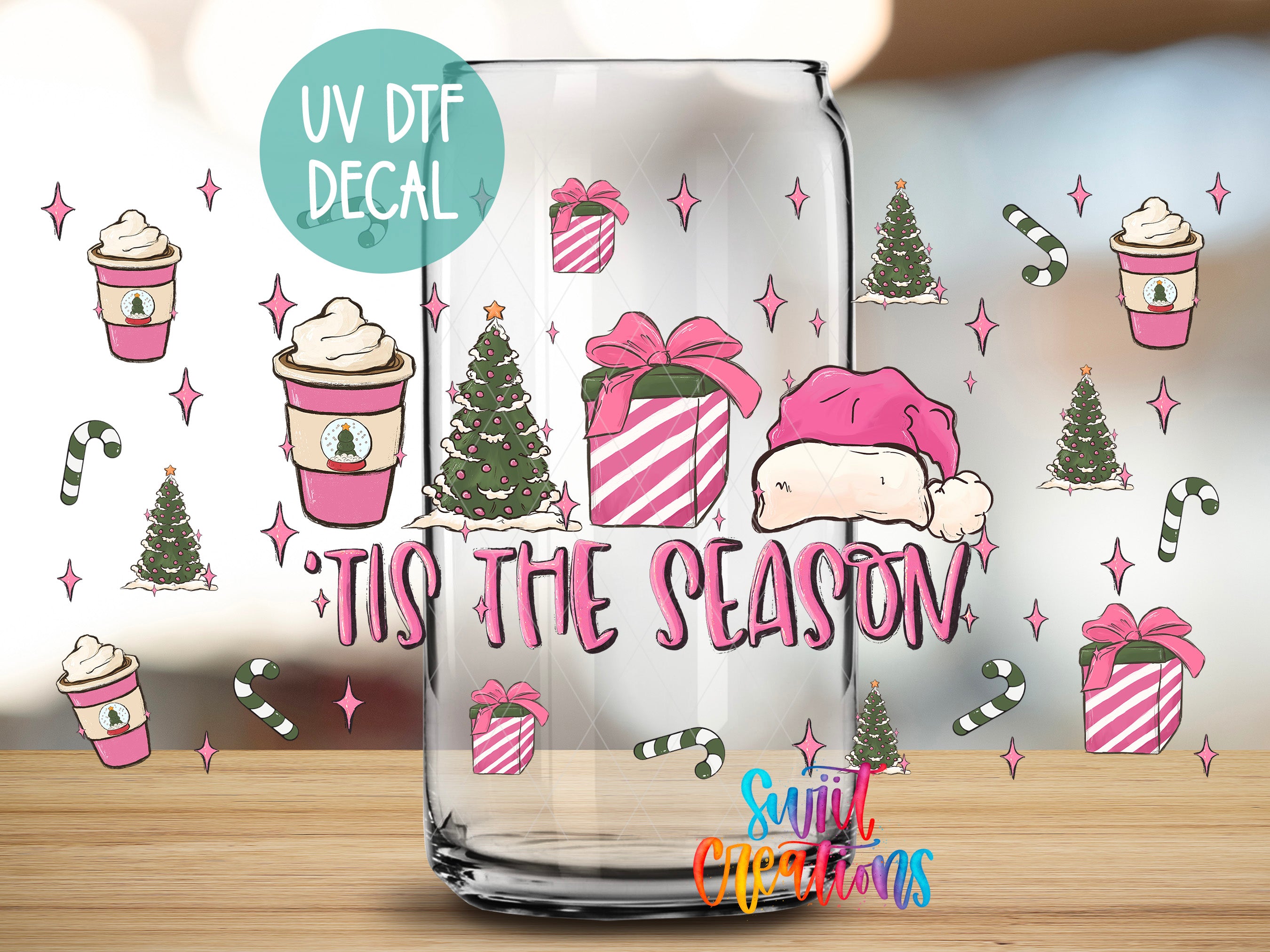 a glass jar with a festive design, including Christmas trees, gift boxes, and a Santa hat. The text "Tis the Season" is prominently displayed on the jar, and the background is decorated with various Christmas-themed elements such as snowflakes, candy canes, and other holiday decorations.