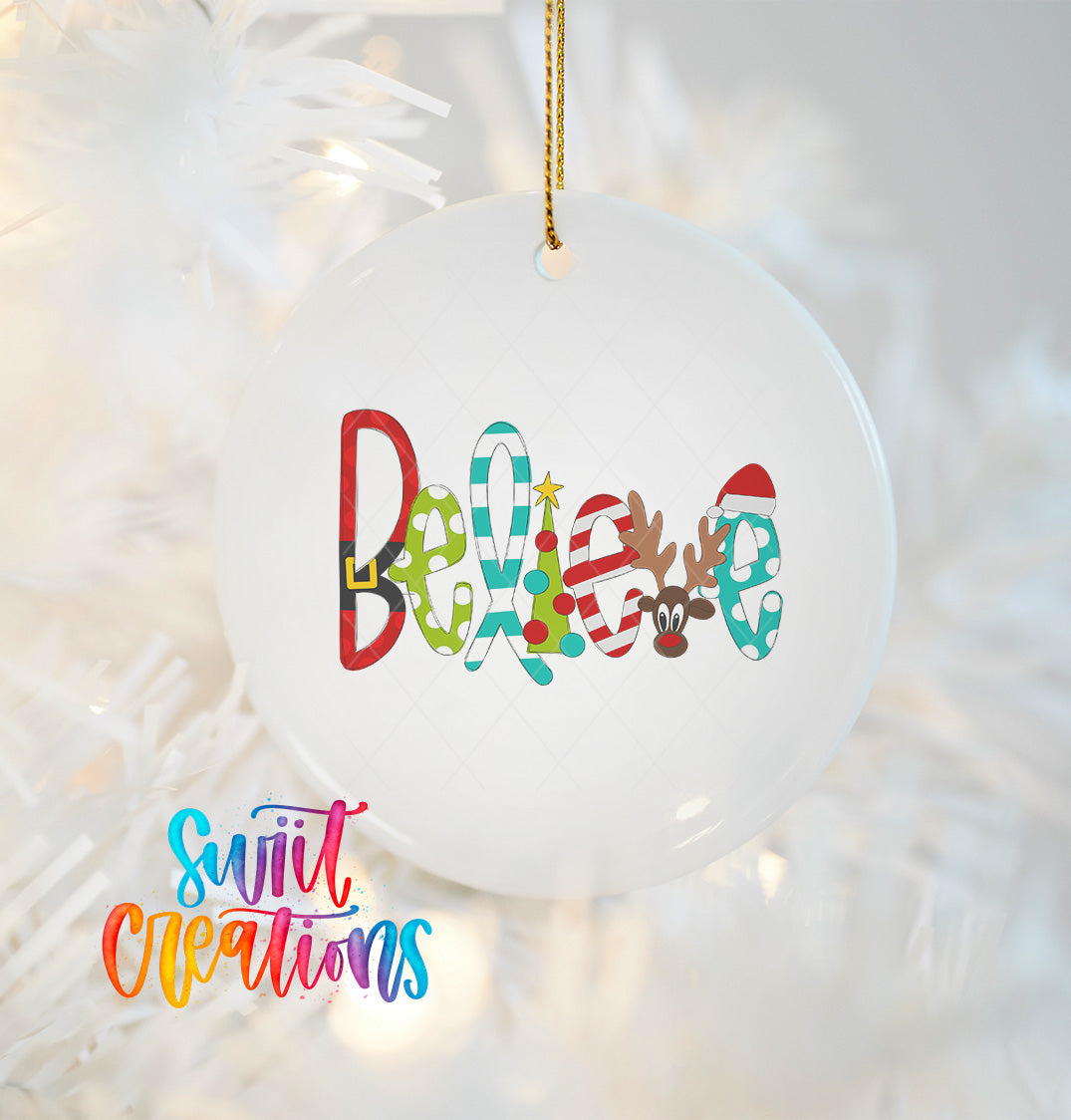 A white ornament with the word "Believe" written in a colorful, playful font.