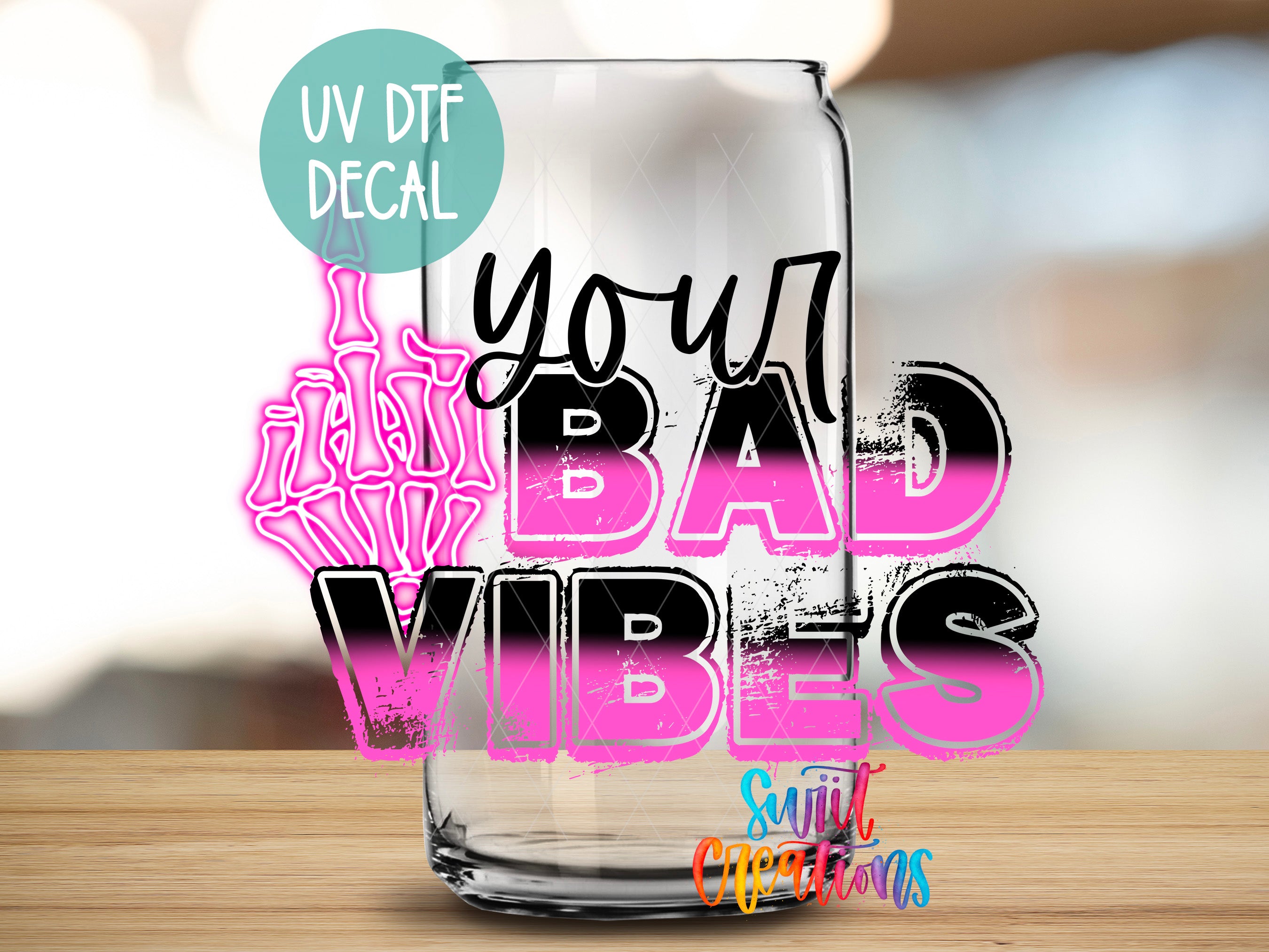 a glass with the words i love you bad vibes on it