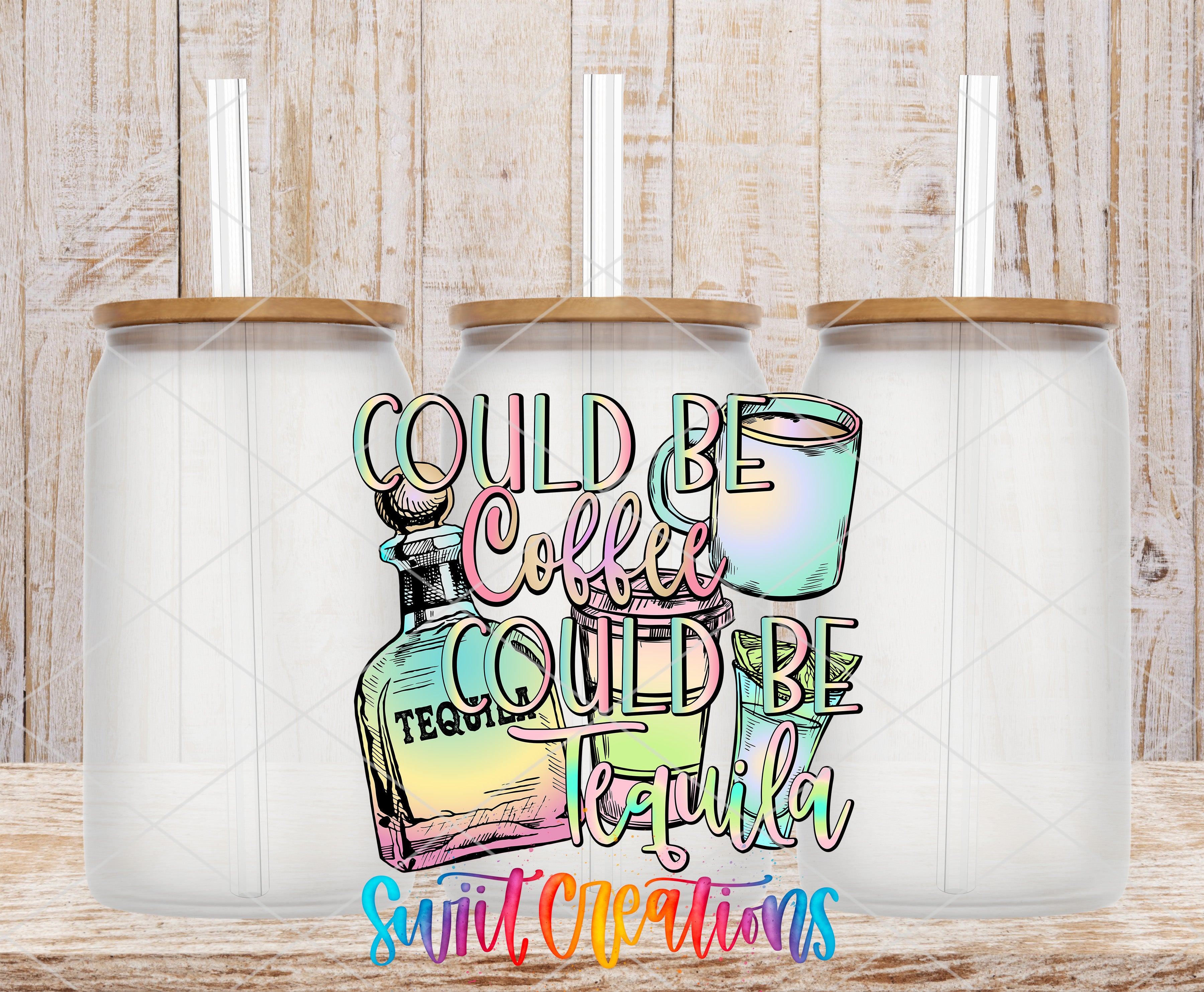 Three clear glass cans with the Could Be Coffee Could Be Tequila UV DTF transfer by Swiit Creations