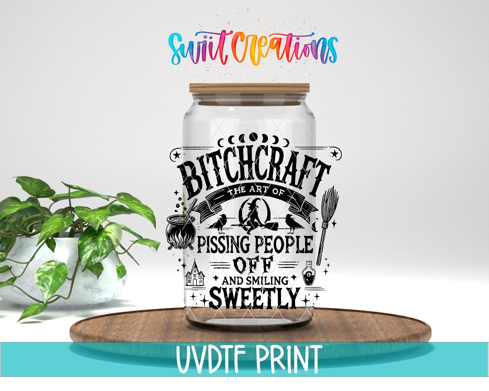 a clear glass jar with a label that reads "Bitchcraft The art of Pissing people off and smiling sweetly" in a whimsical, artistic style. The jar is placed on a wooden tray, and there is a potted plant in the background.