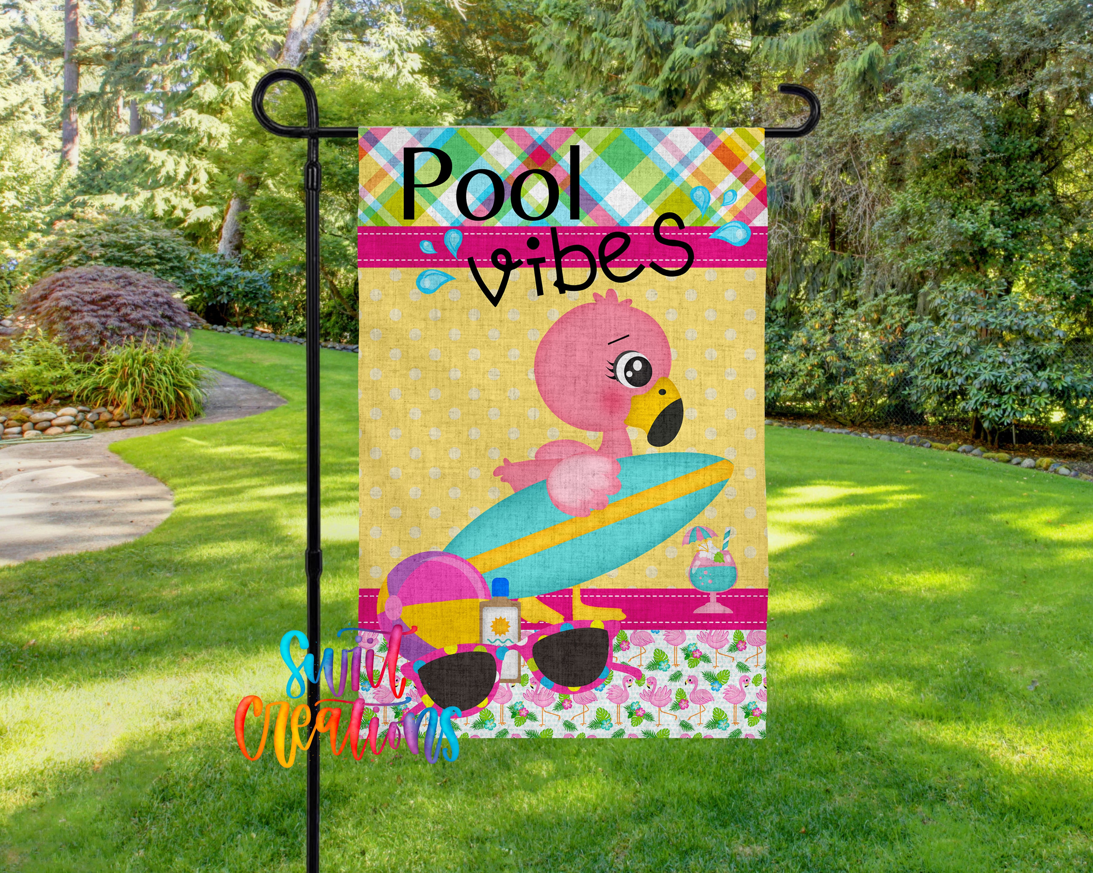 A colorful poolside sign featuring a pink flamingo holding a surfboard and sunglasses, with the text "Pool vibes" and "Summer vibes" displayed.