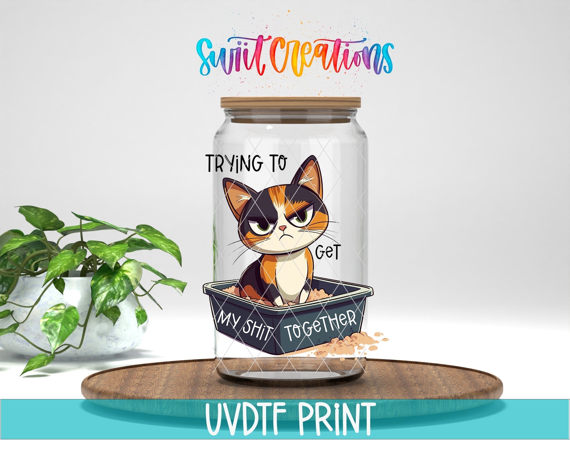 a glass jar with a picture of a cat inside of it