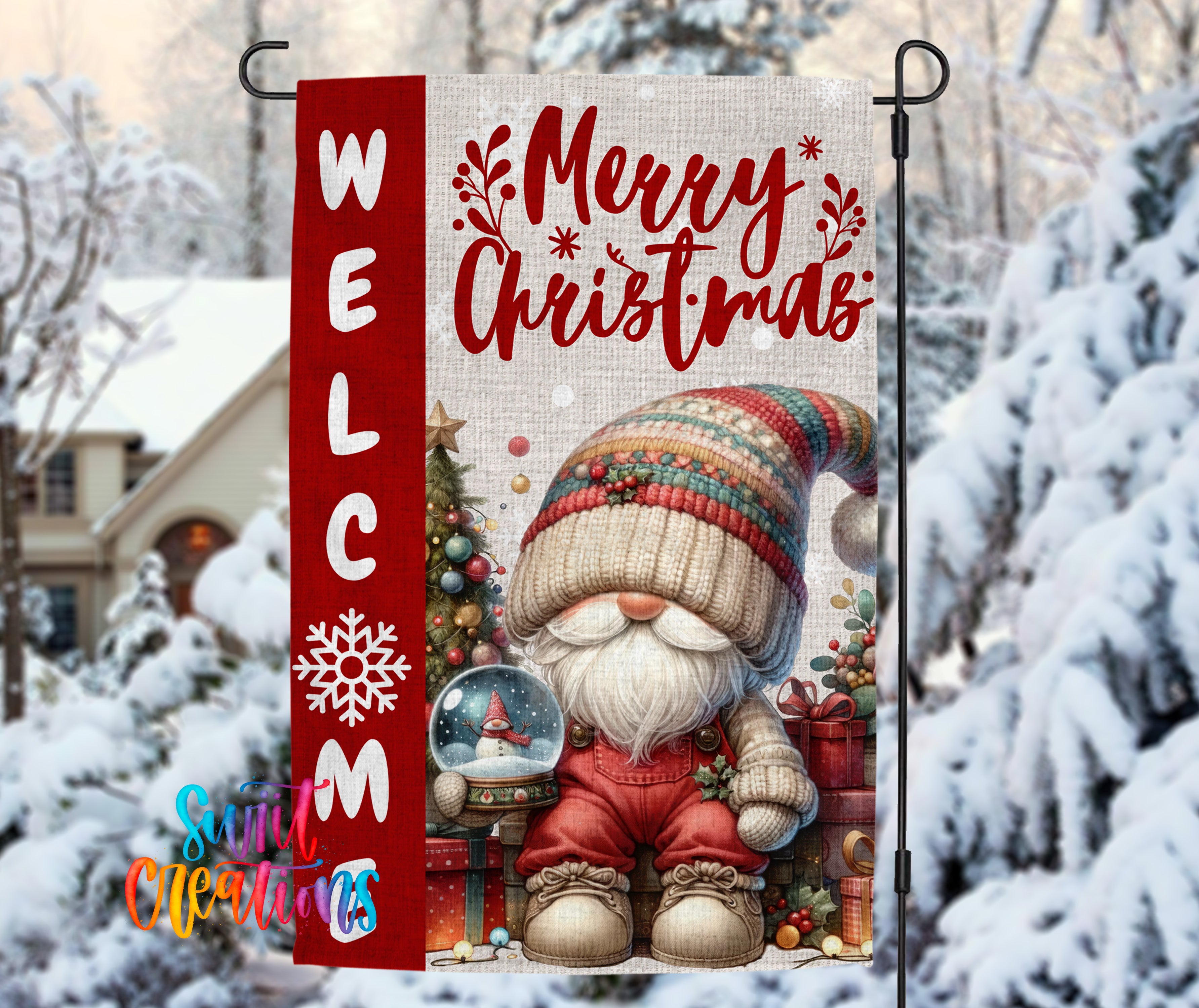 A red and white welcome sign with a gnome holding a snow globe, set against a snowy background with trees and a house.