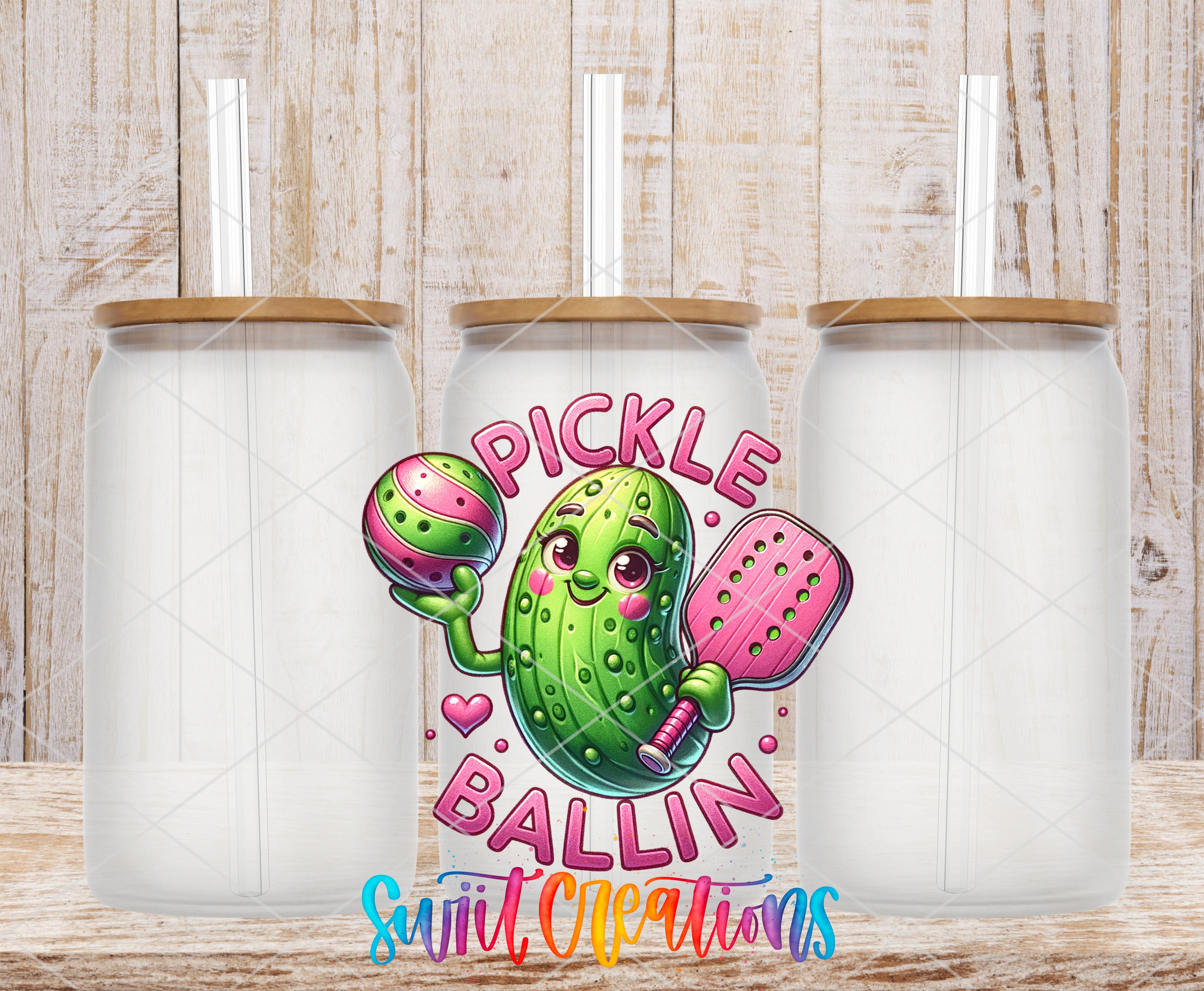 Swiit Creations UV DTF Pickle Ballin transfer shown on a clear glass can set