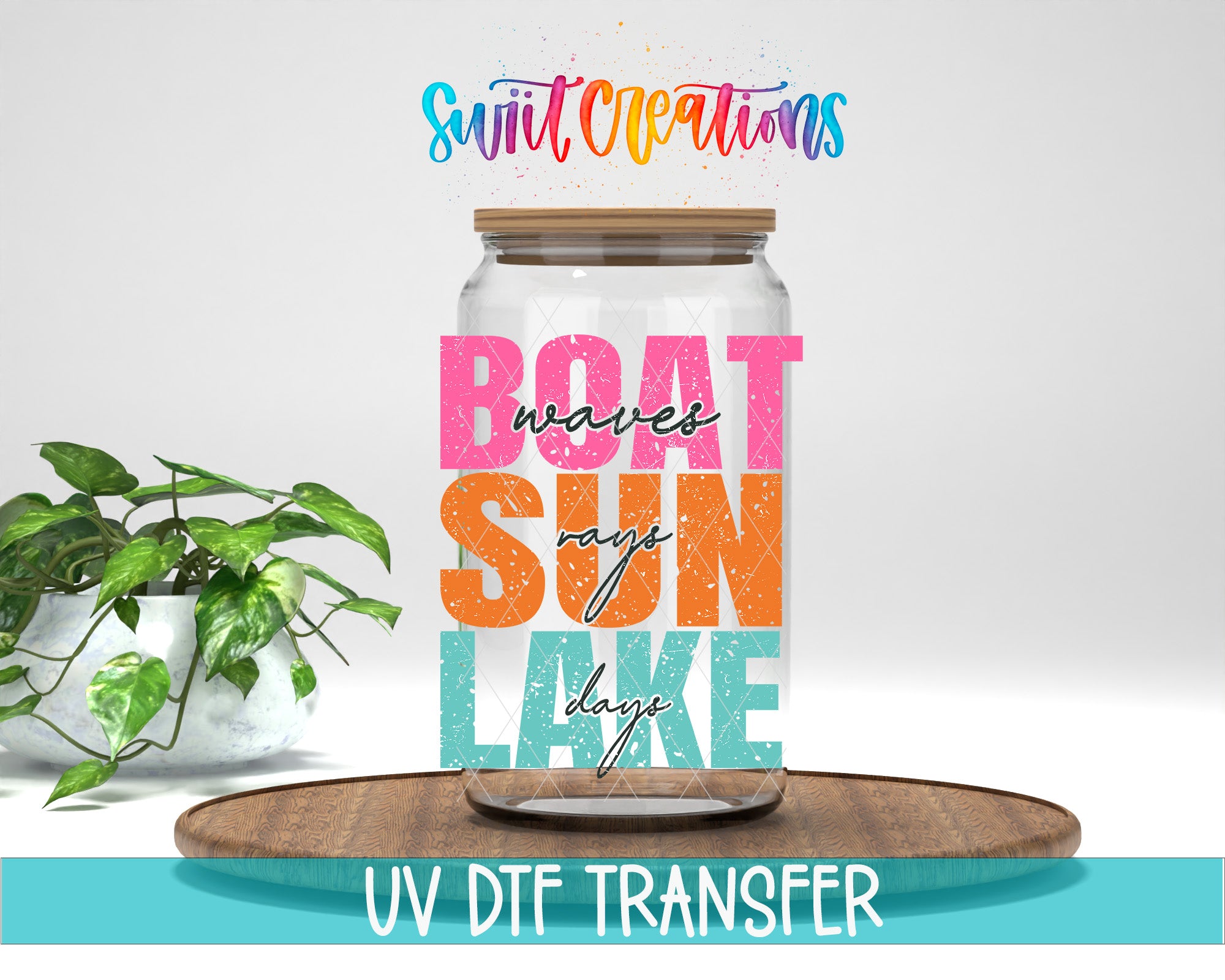 a glass jar with the text "BOAT SUN LAKE" written on it, placed on a wooden surface. There is also a potted plant in the background.