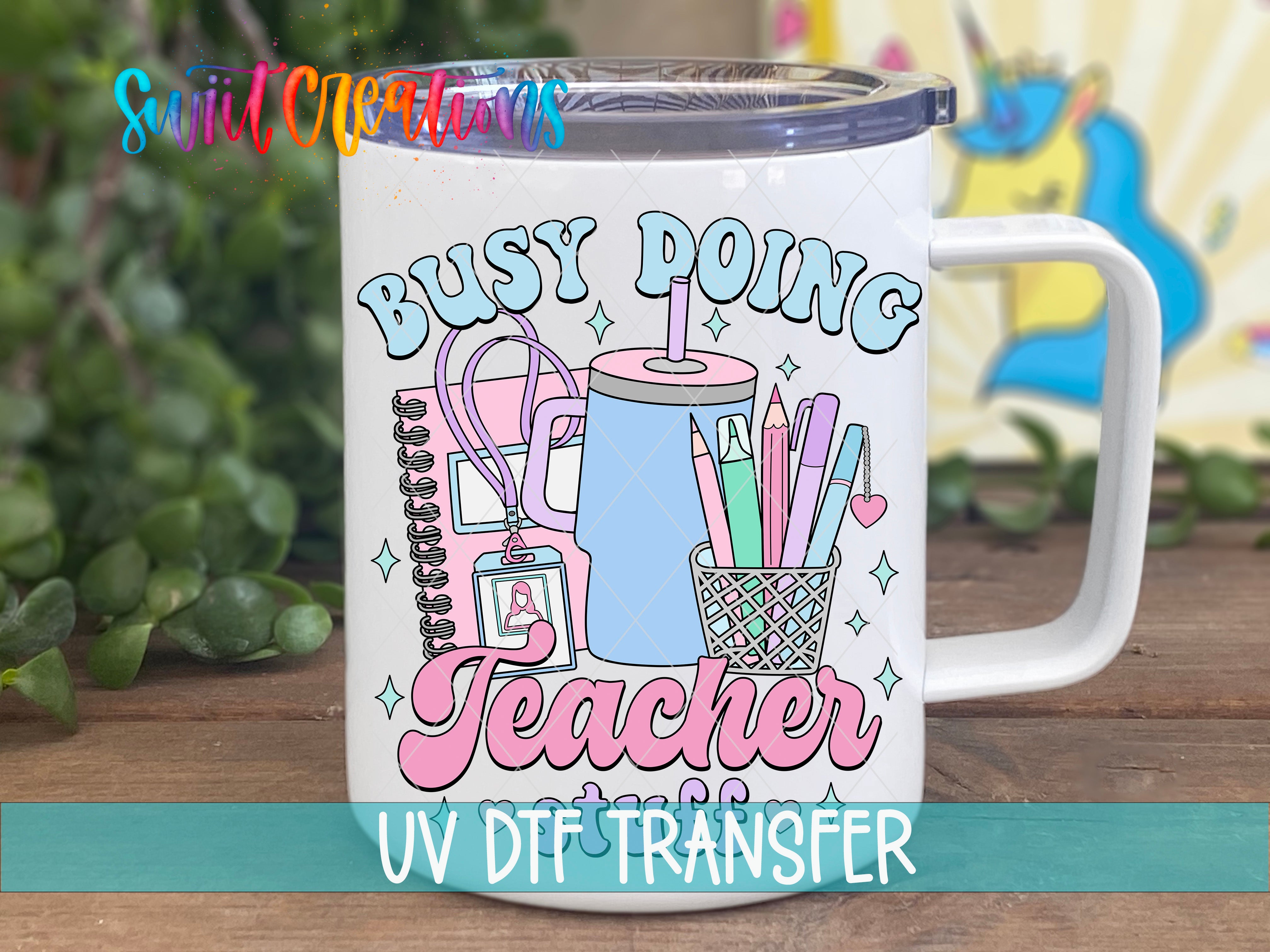 Swiit Creations UV DTF Busy Doing Teacher Stuff transfer displayed on a white coffee mug