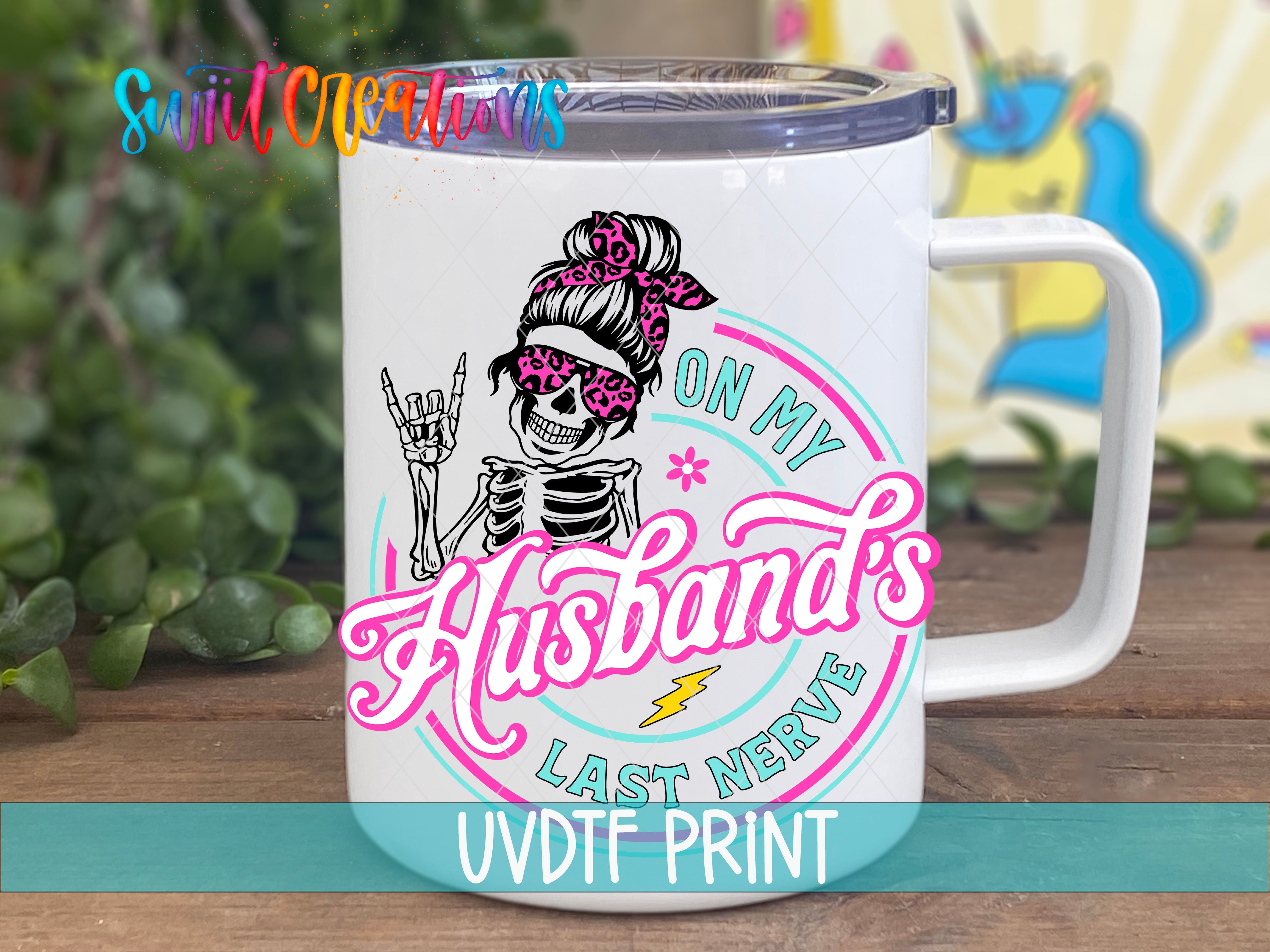 a white coffee mug with a skeleton on it