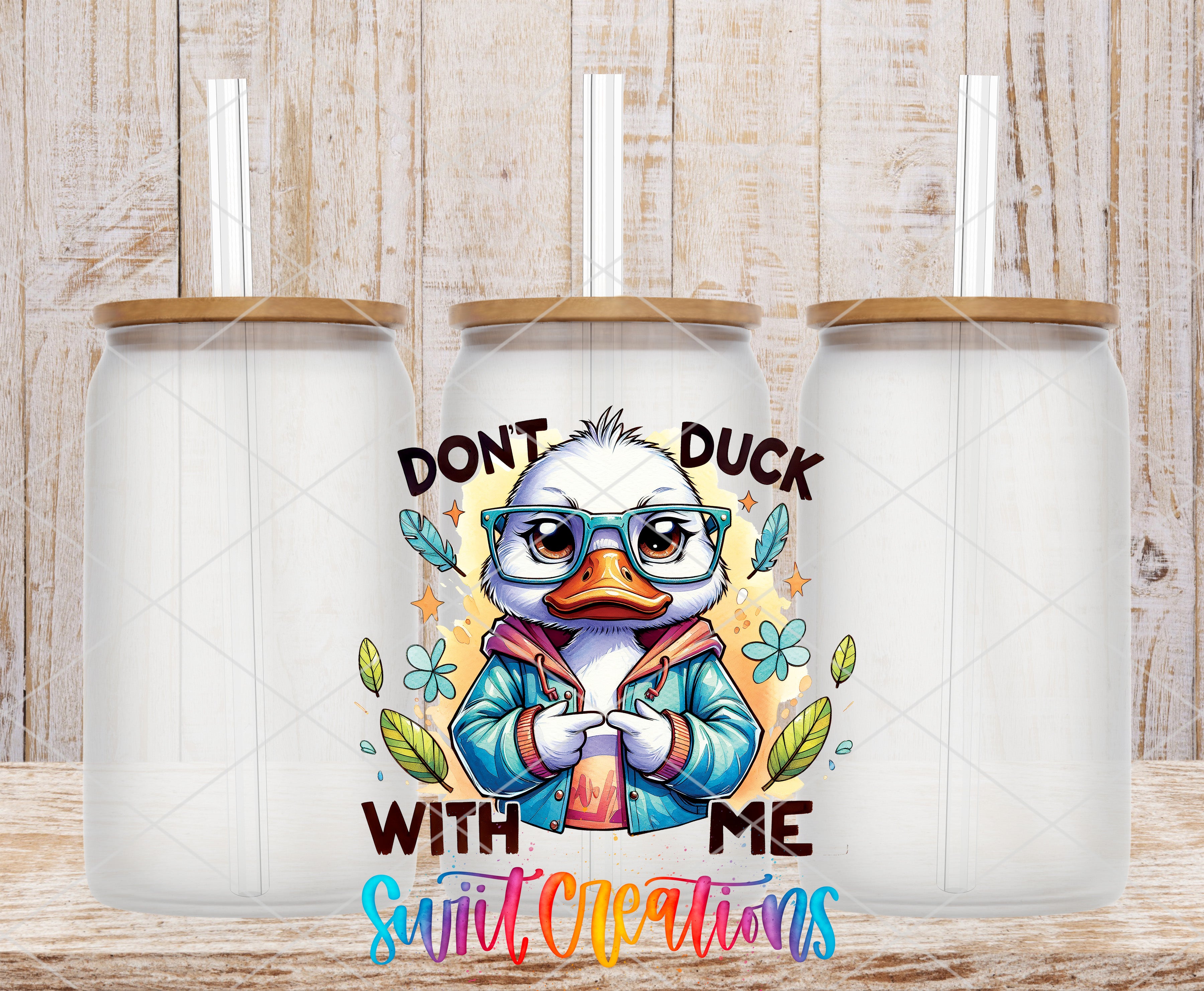 Swiit Creations UV DTF Don’t Duck With Me transfer shown on a clear glass can set