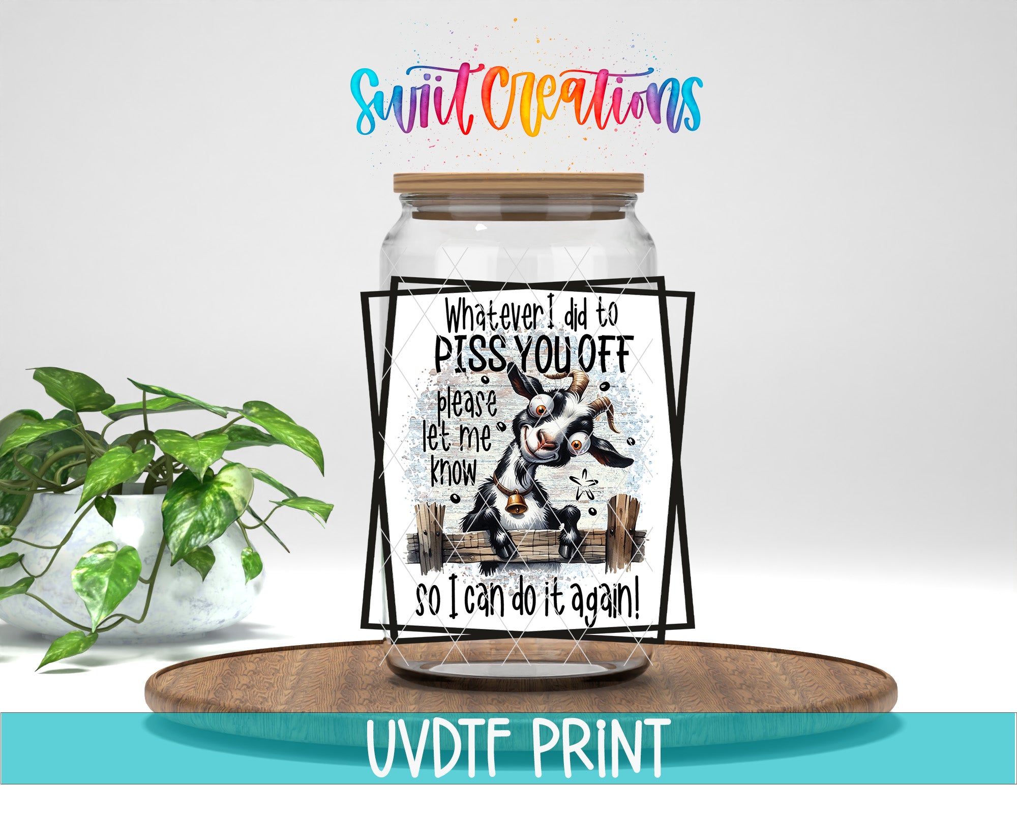 a glass jar with a printed message on it, placed on a wooden surface.