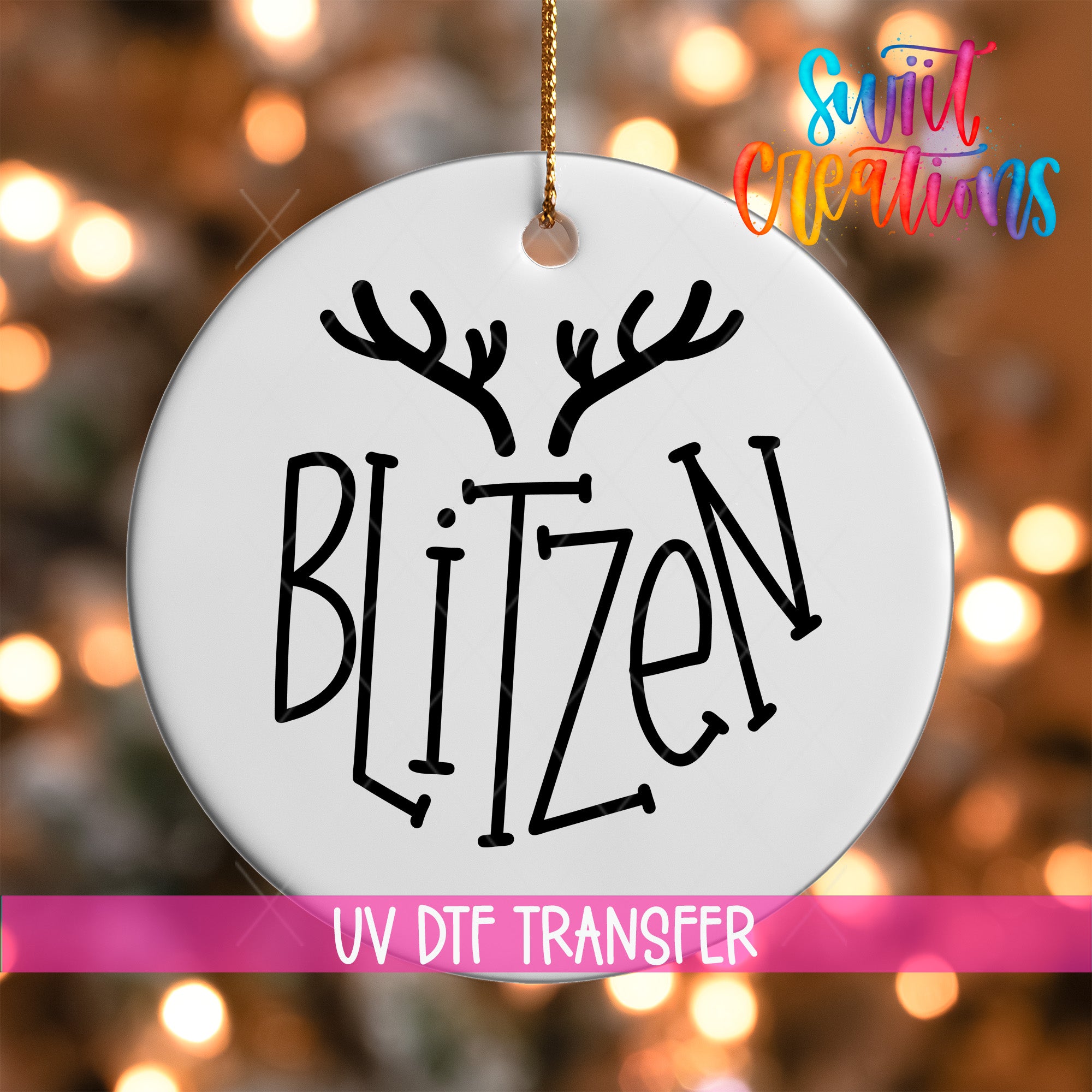 A white ornament with the word "BLITZEN" written on it, hanging against a background of colorful lights.