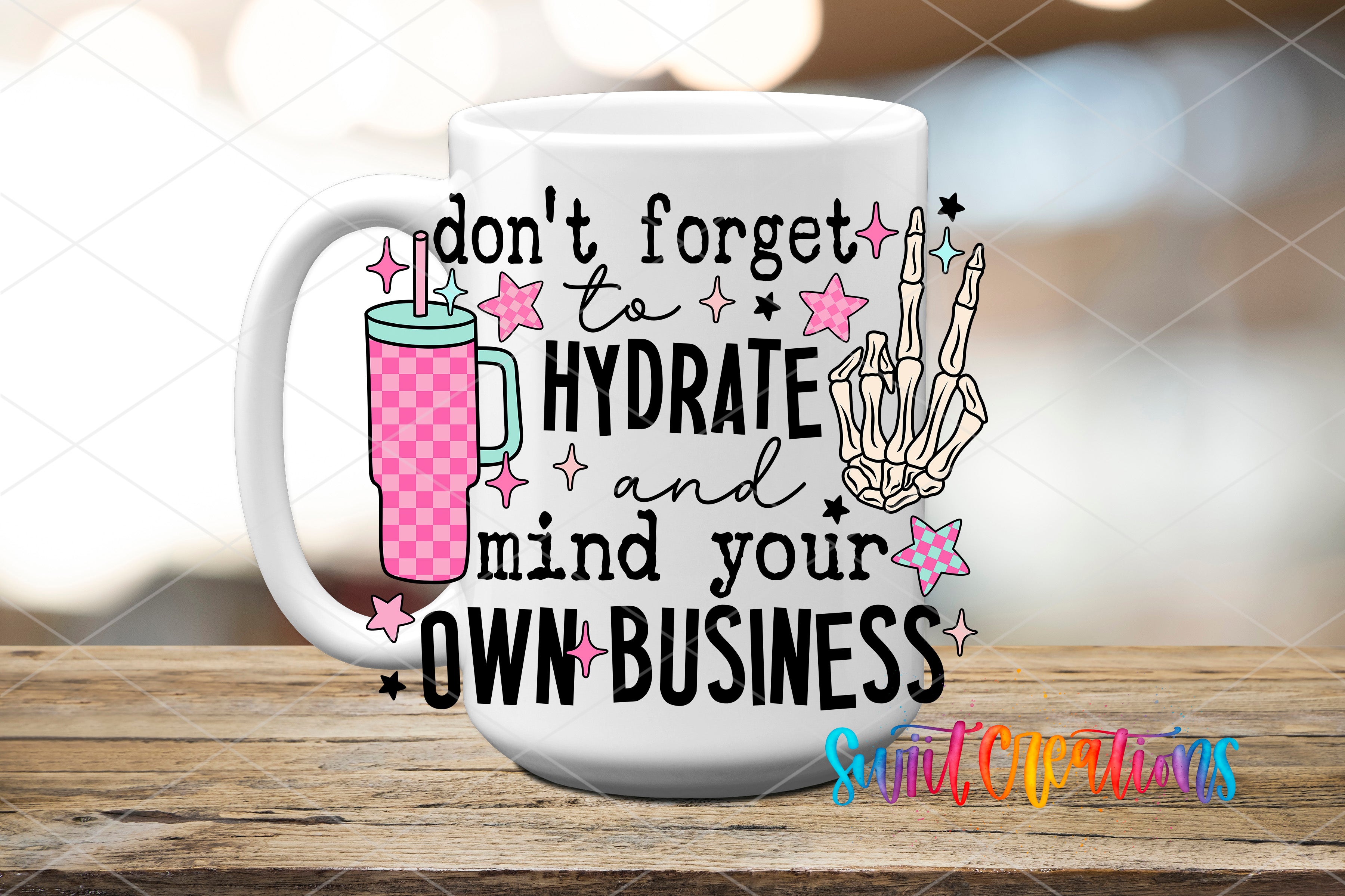 Swiit Creations UV DTF Hydrate and Mind Your Business transfer applied to a white ceramic mug