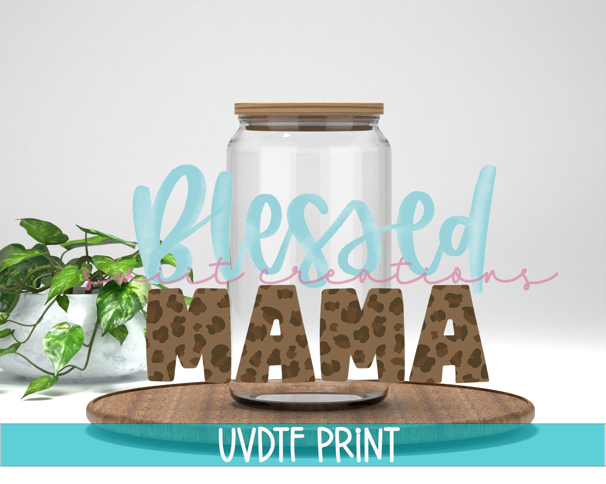 a glass jar with the word mama on it next to a plant