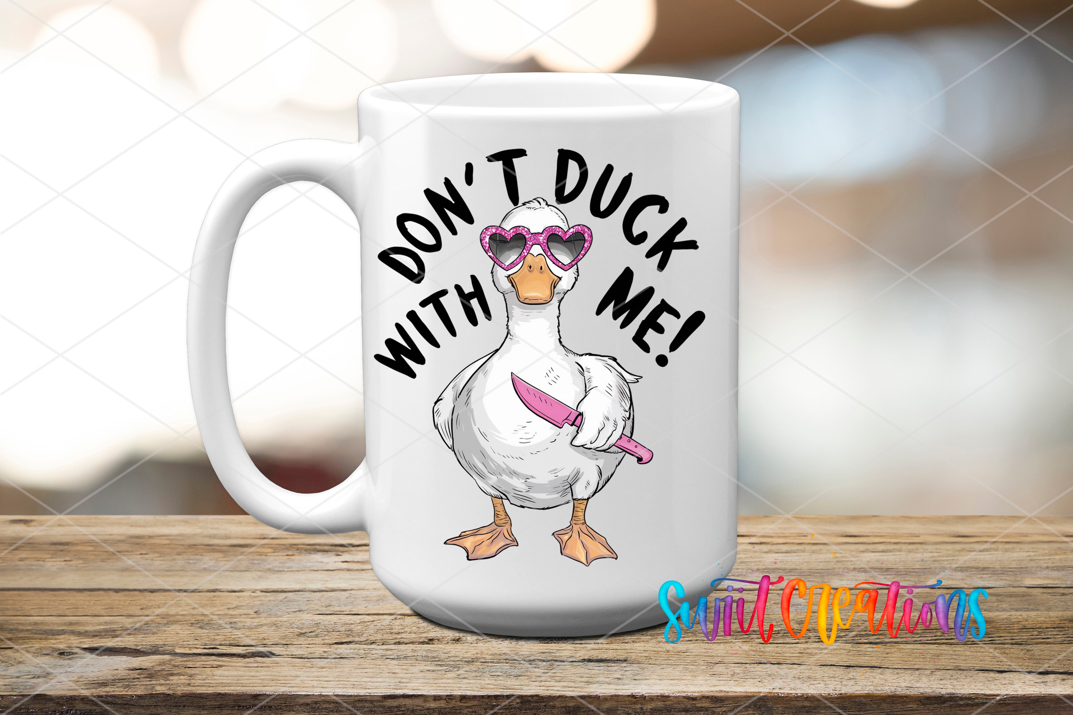 Swiit Creations UV DTF Don’t Duck With Me transfer applied to a white ceramic mug