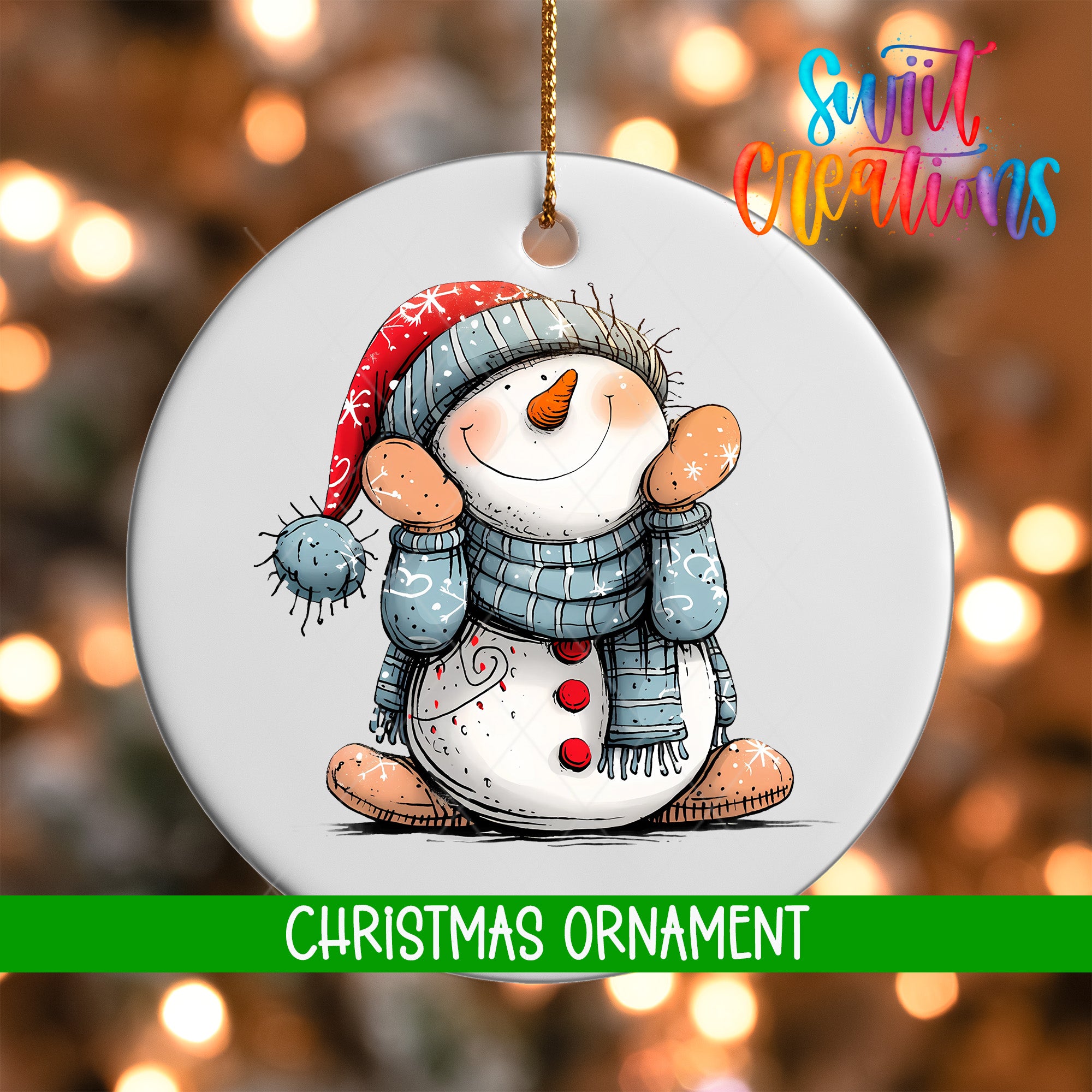 A white Christmas ornament featuring a smiling snowman wearing a red hat and blue scarf, with a green ribbon around its neck.