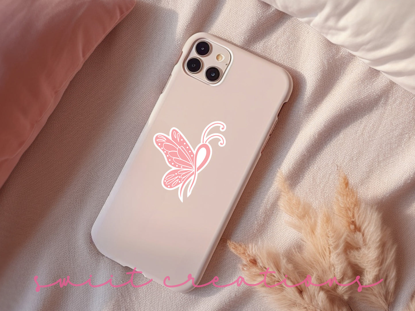 a phone case with a pink butterfly on it