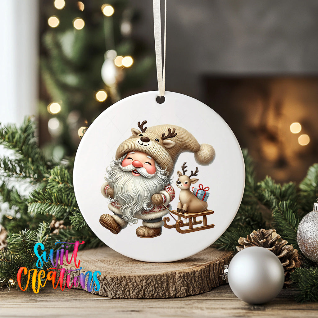A white ornament featuring a smiling Santa Claus with reindeer and a gift, surrounded by Christmas decorations and ornaments.