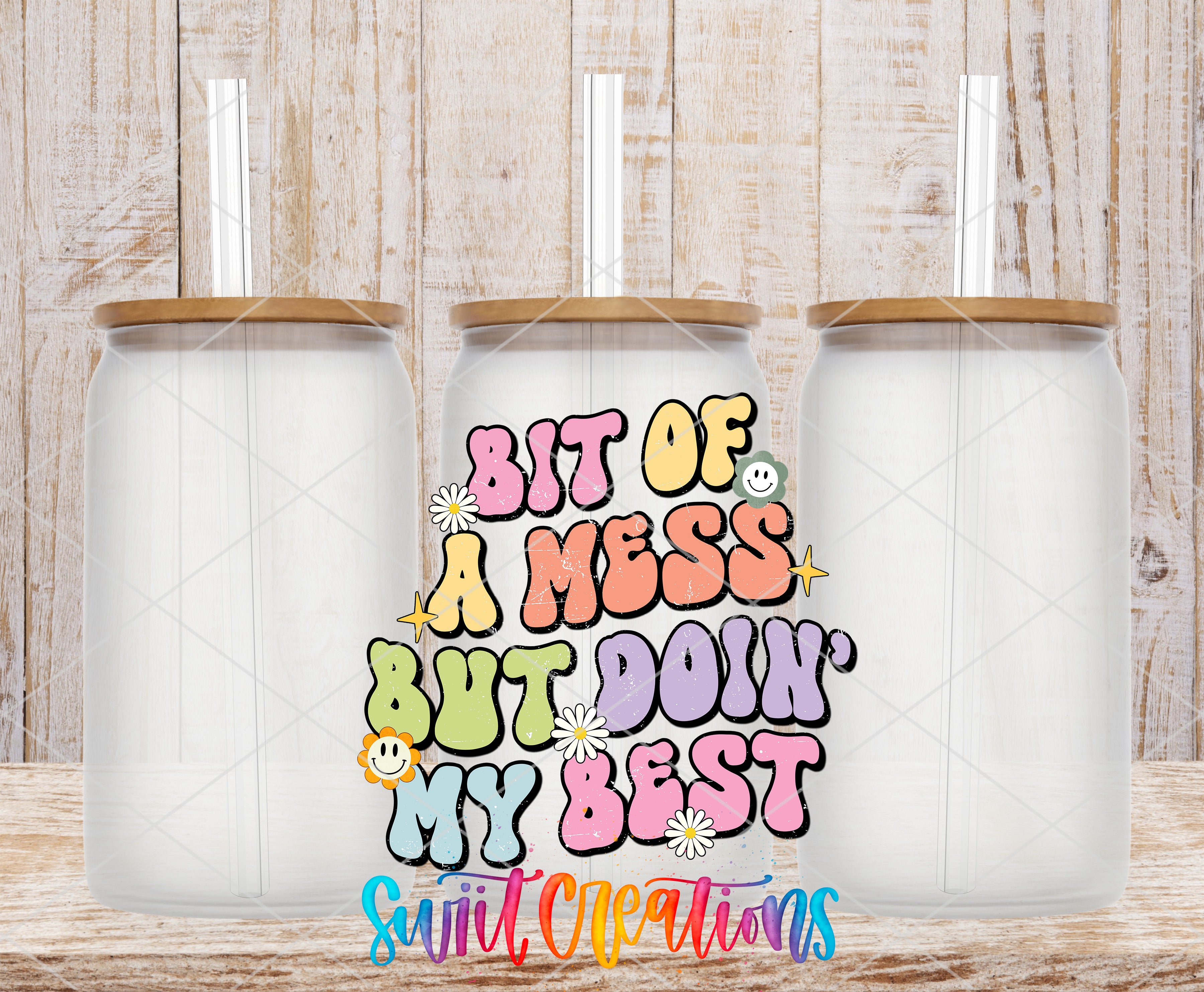 Swiit Creations UV DTF A Bit of a Mess Doing My Best transfer shown on a clear glass can set