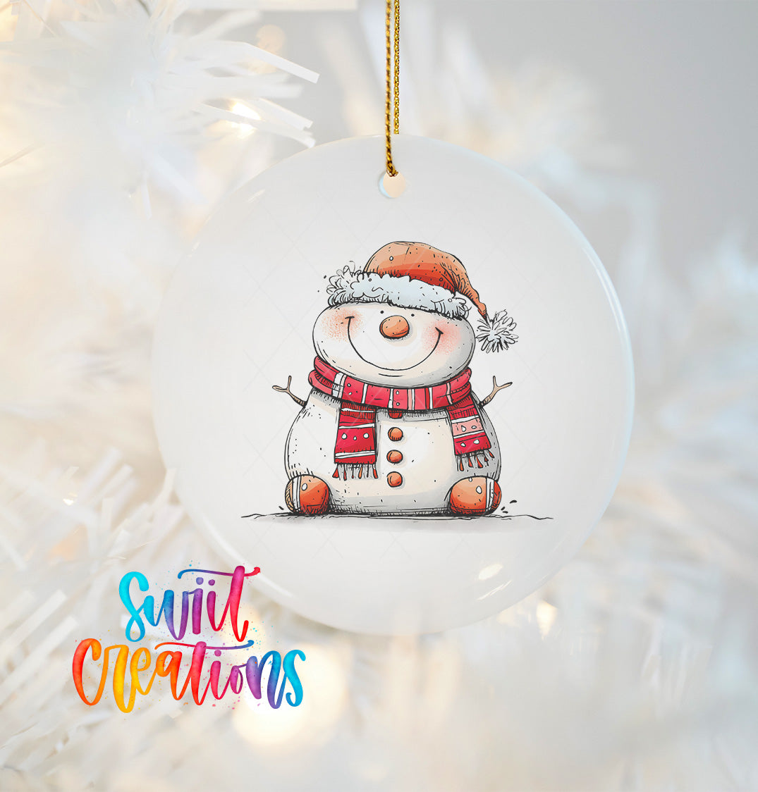 A white ornament featuring a smiling snowman wearing a red scarf and hat.