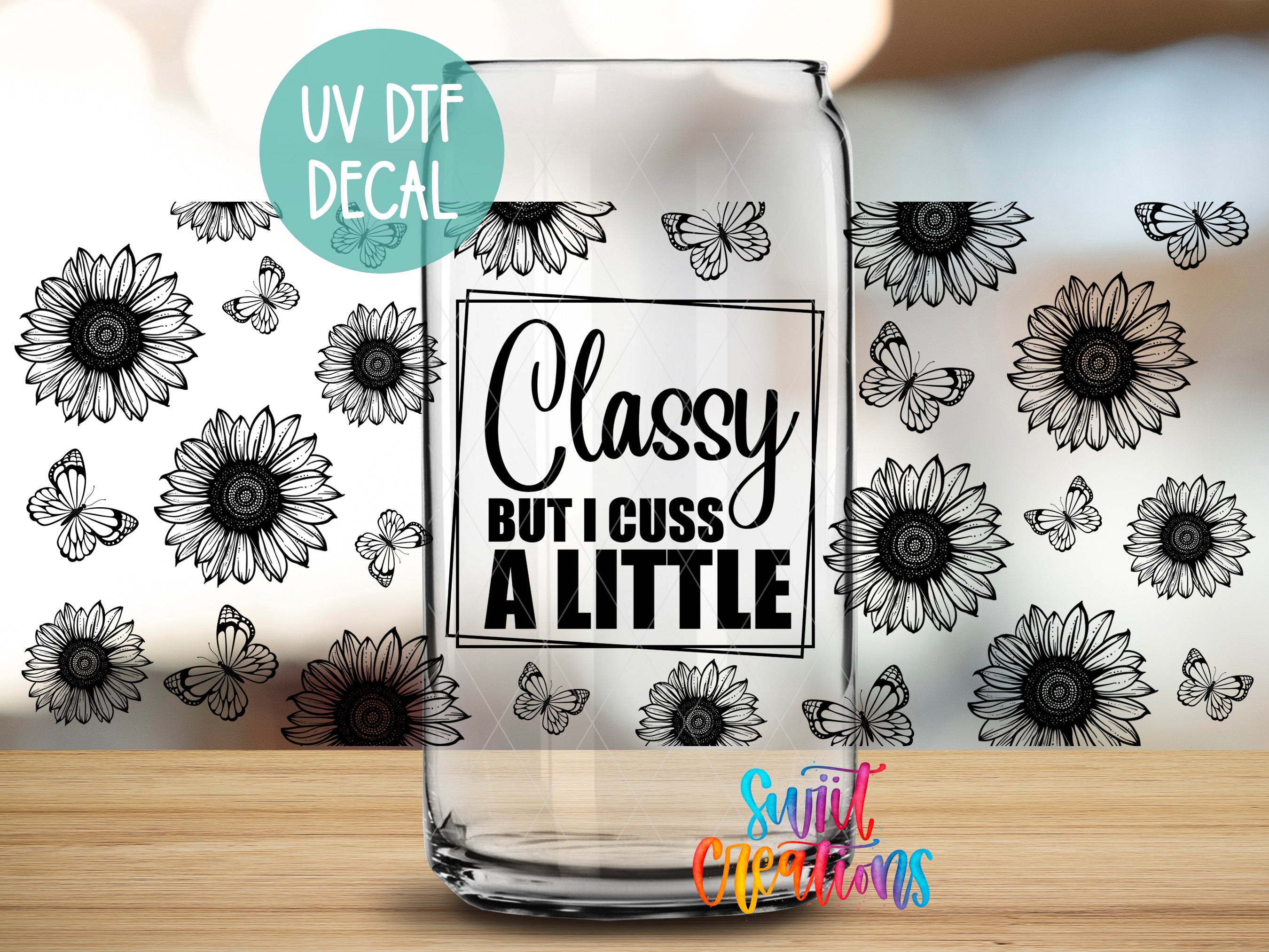 a glass with a picture of a sunflower on it