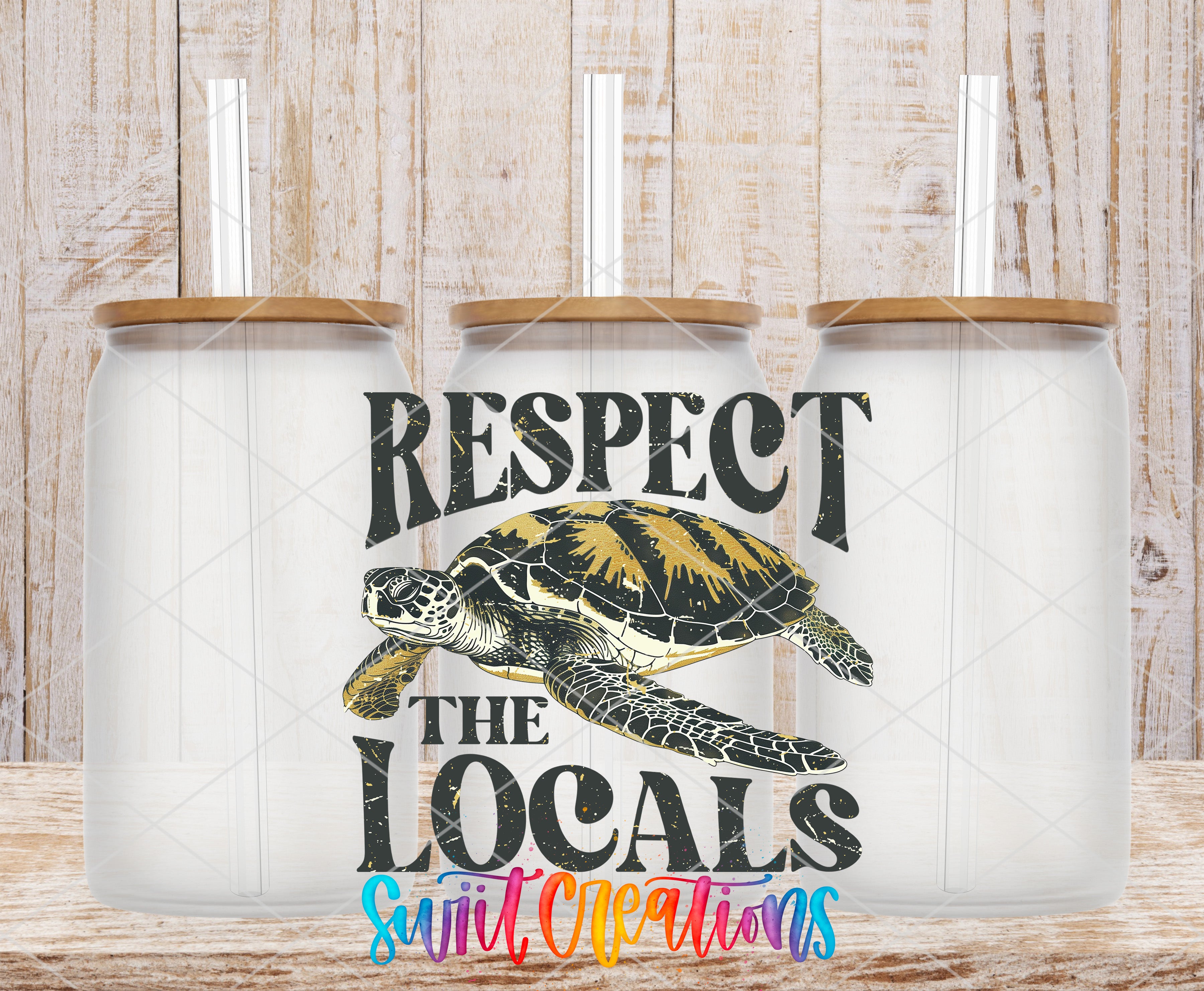 Swiit Creations UV DTF Respect the Locals transfer shown on a clear glass can set
