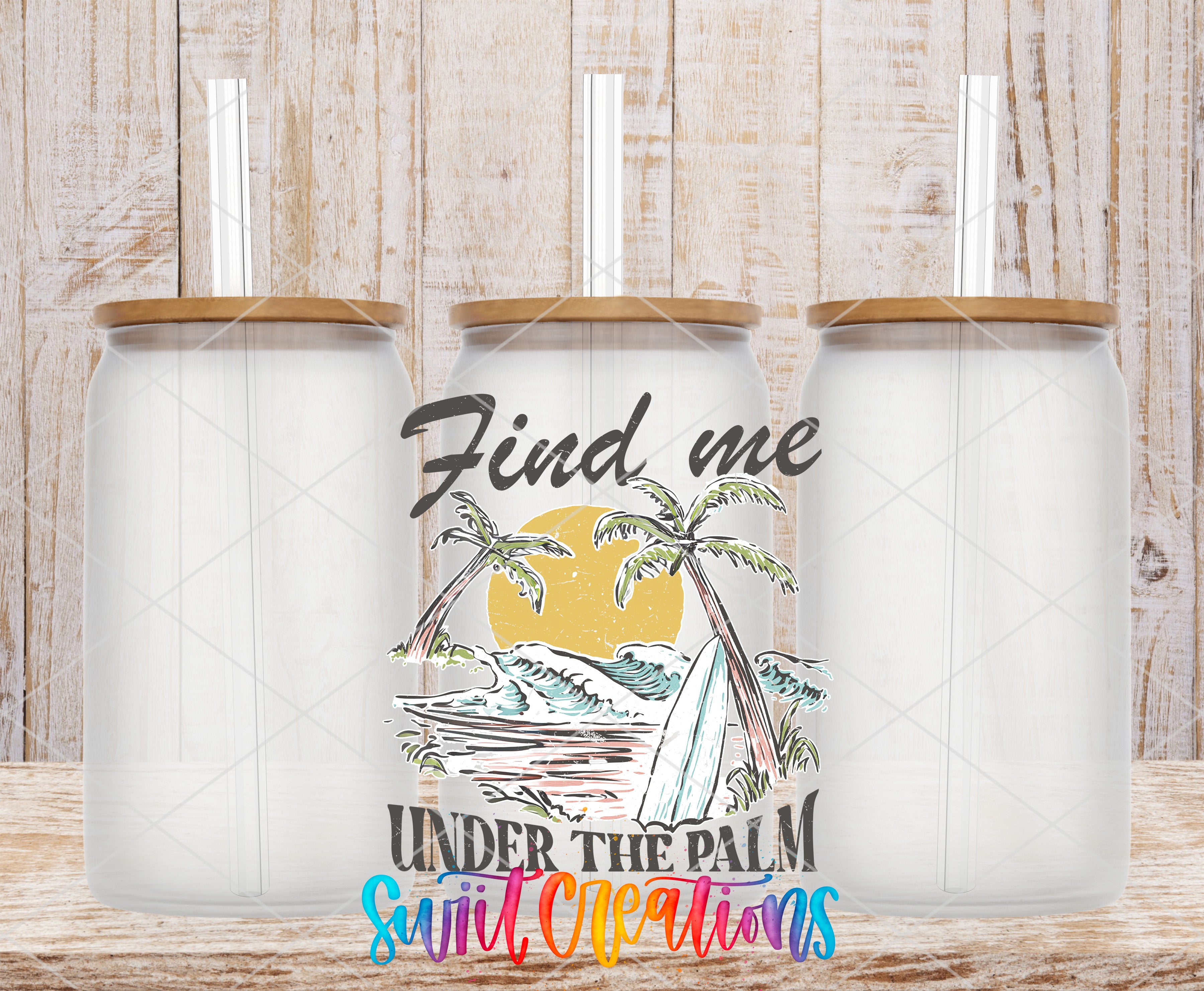 Swiit Creations UV DTF Find Me Under the Palm transfer shown on a clear glass can set