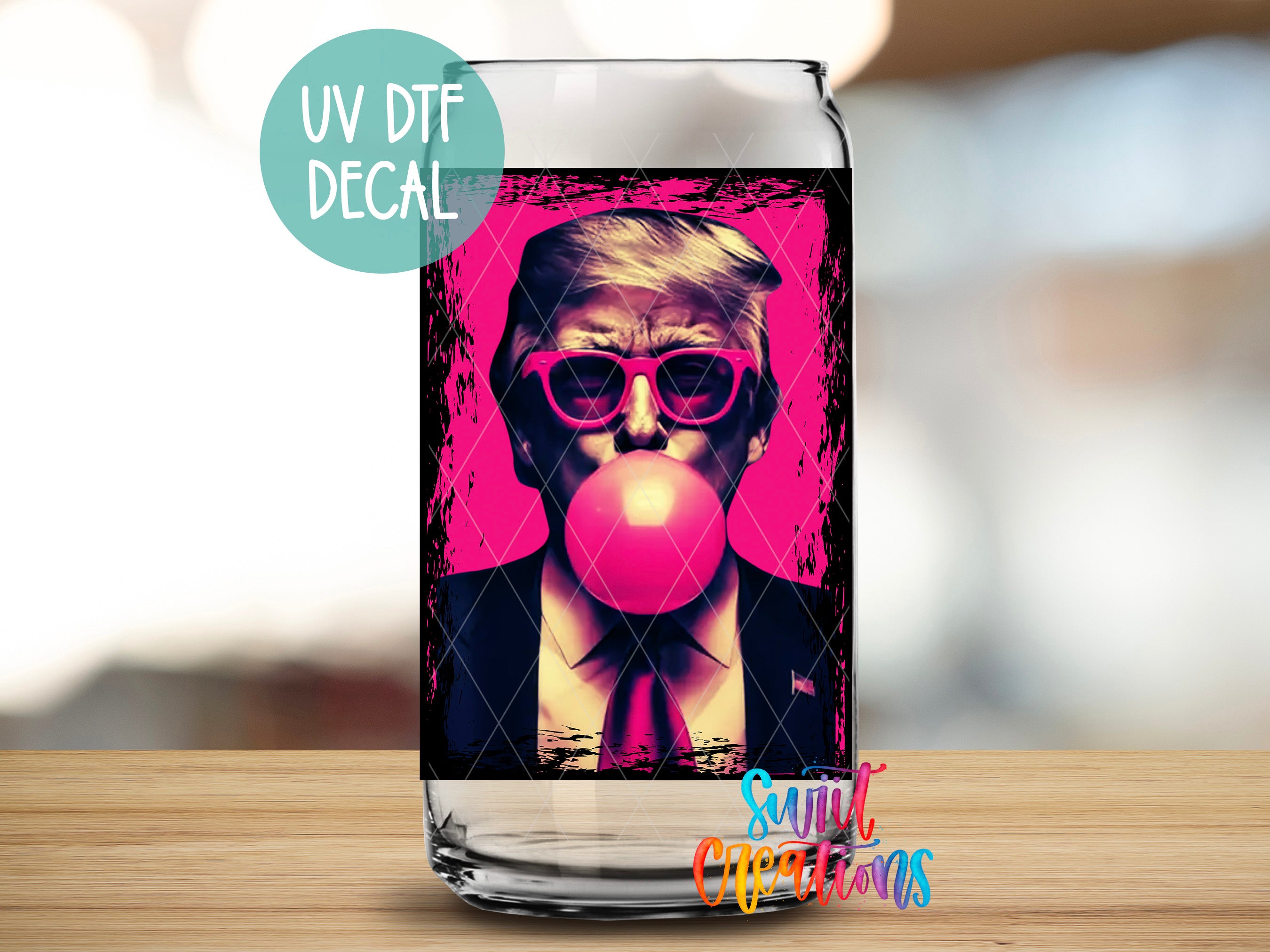 a glass with a picture of a man blowing a bubble