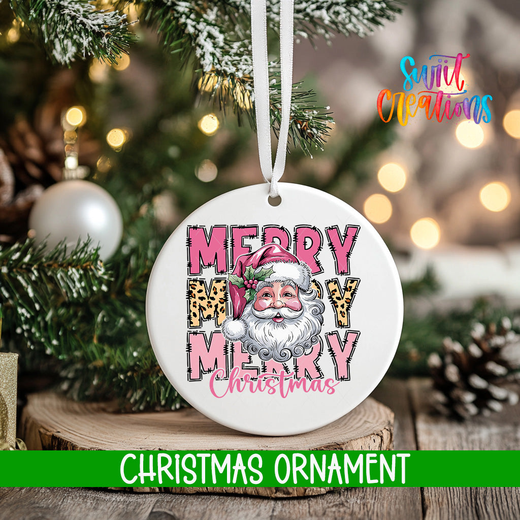A white Christmas ornament with a Santa Claus face and the text "MERRY MARY CHRISTMAS" hanging from a string.