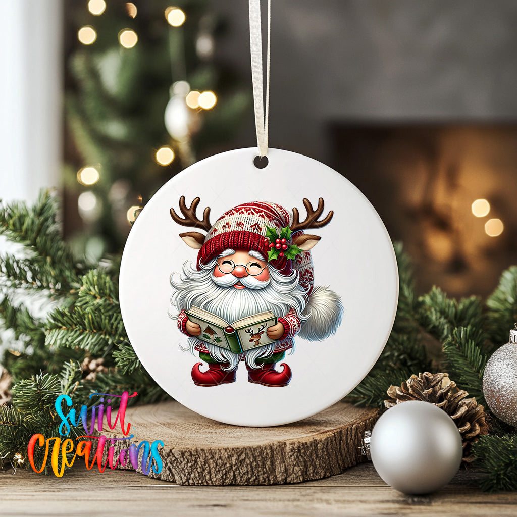 A white ornament featuring a smiling gnome holding a book, surrounded by Christmas decorations and greenery.