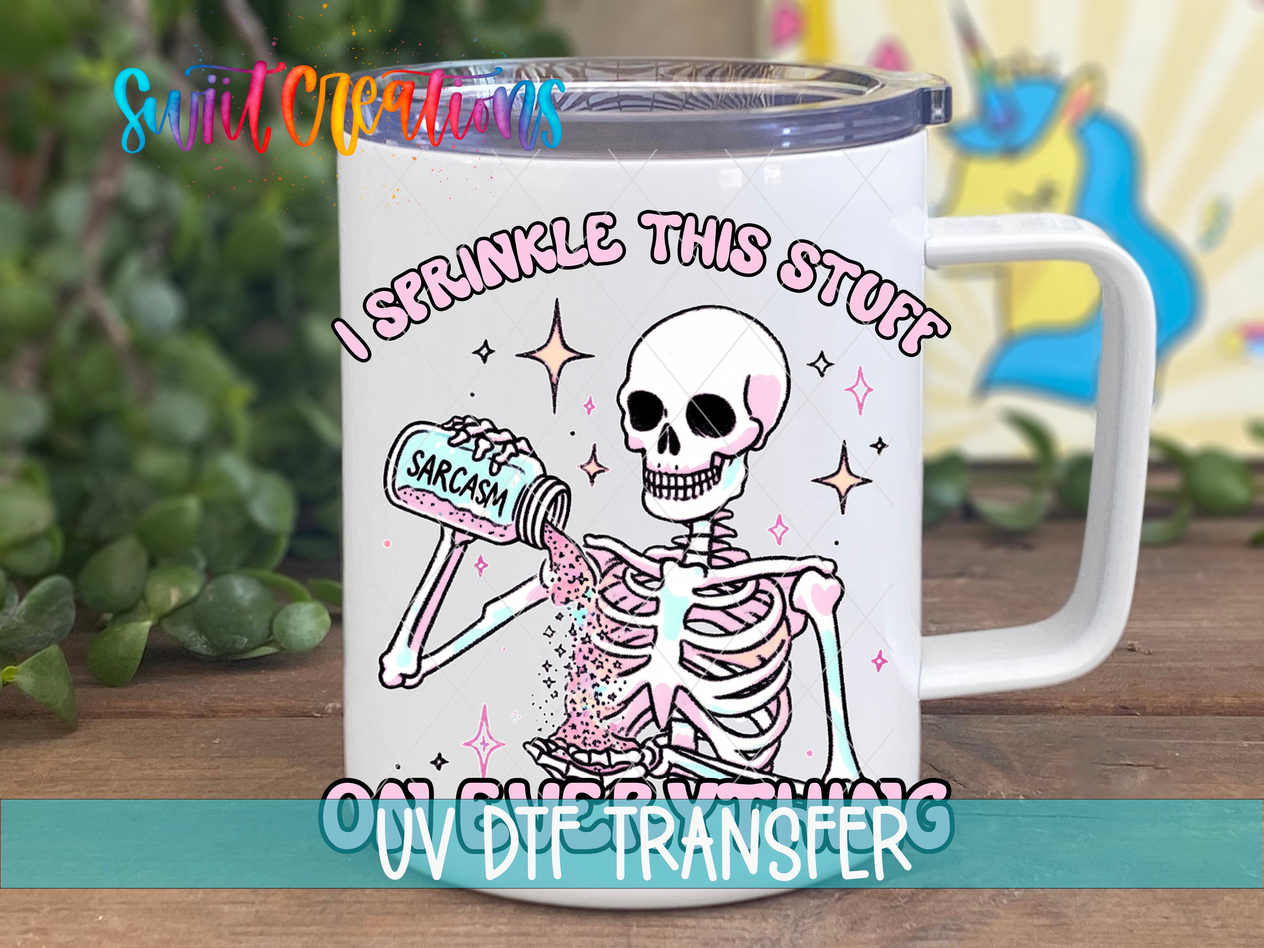 Swiit Creations UV DTF Sarcasm Skeleton transfer displayed on a white coffee mug