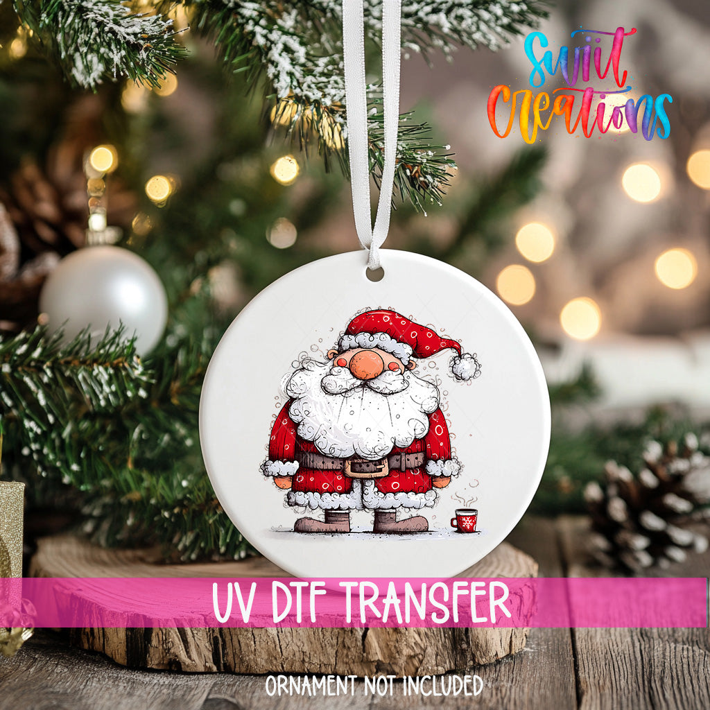 A white ornament with a Santa Claus illustration is hanging on a Christmas tree, with a blurred background of pine branches and twinkling lights.