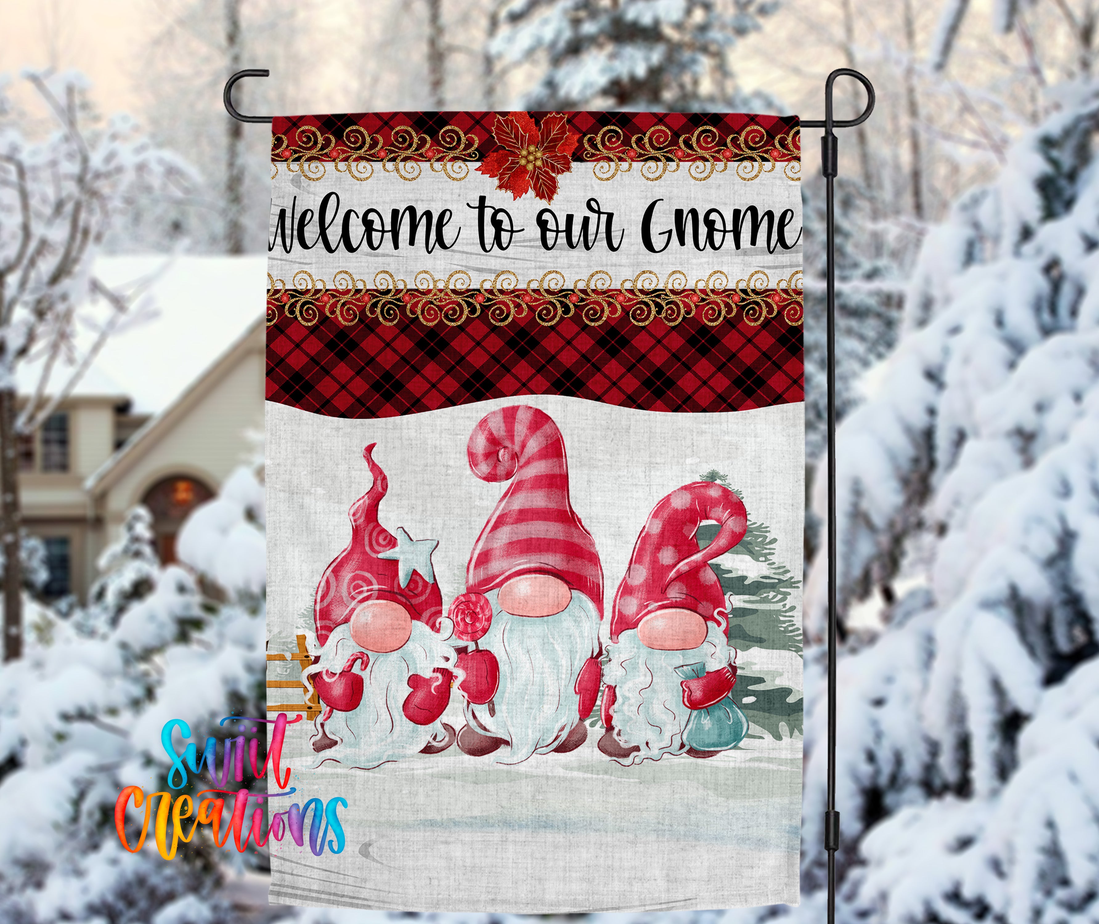 A banner with a festive design featuring three gnomes wearing red and white plaid hats, standing in a snowy landscape with a house and trees in the background.