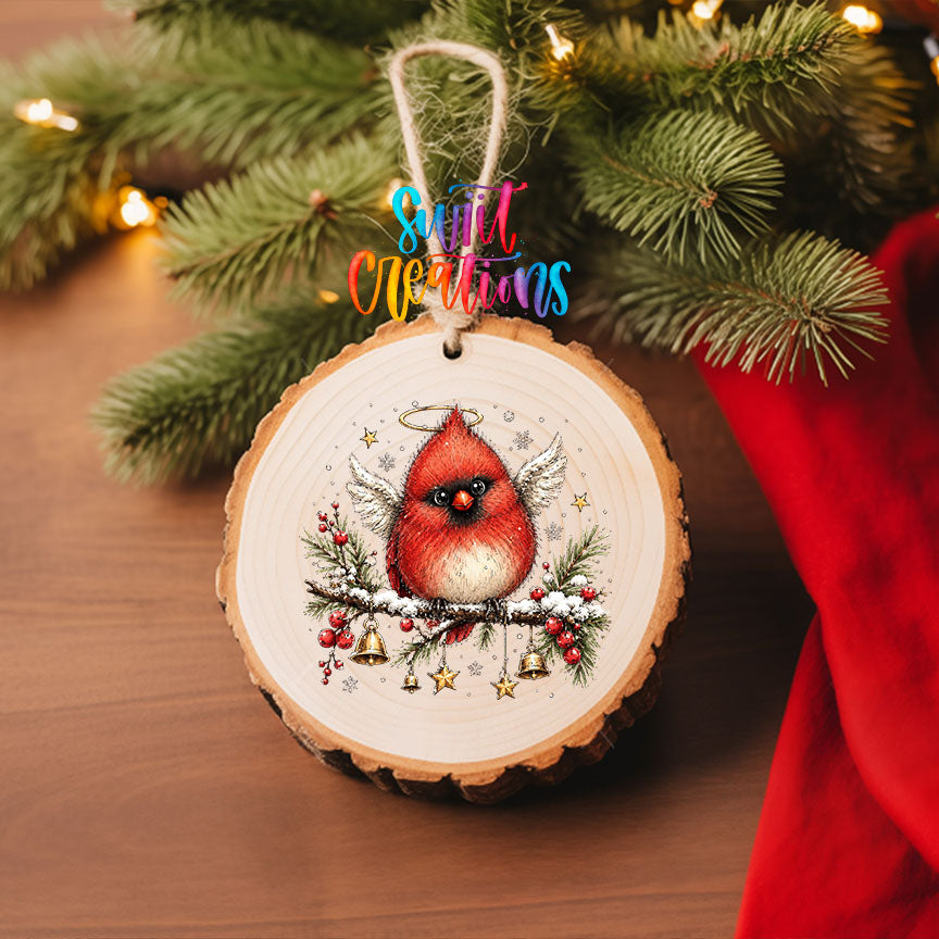 Angel cardinal with halo and wings UV DTF transfer on a wood slice ornament with pine and a red stocking