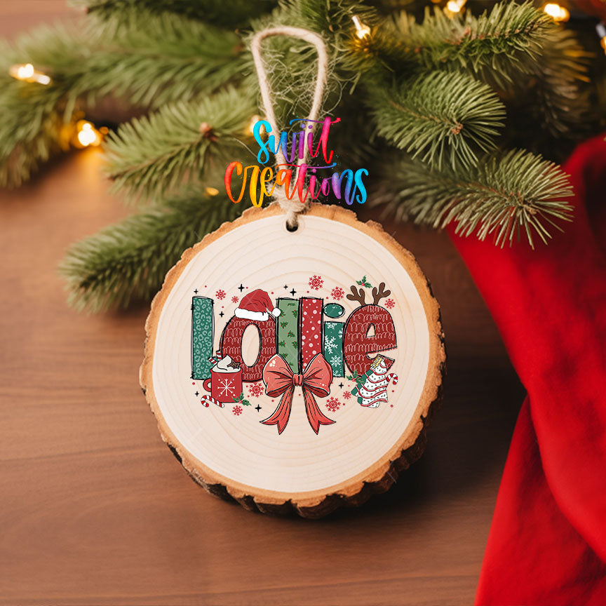 Lollie grandma name UV DTF transfer on a wood slice ornament with pine and a red stocking