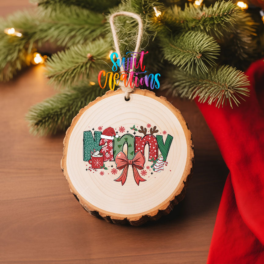 Nanny grandma name UV DTF transfer on a wood slice ornament with pine and a red stocking