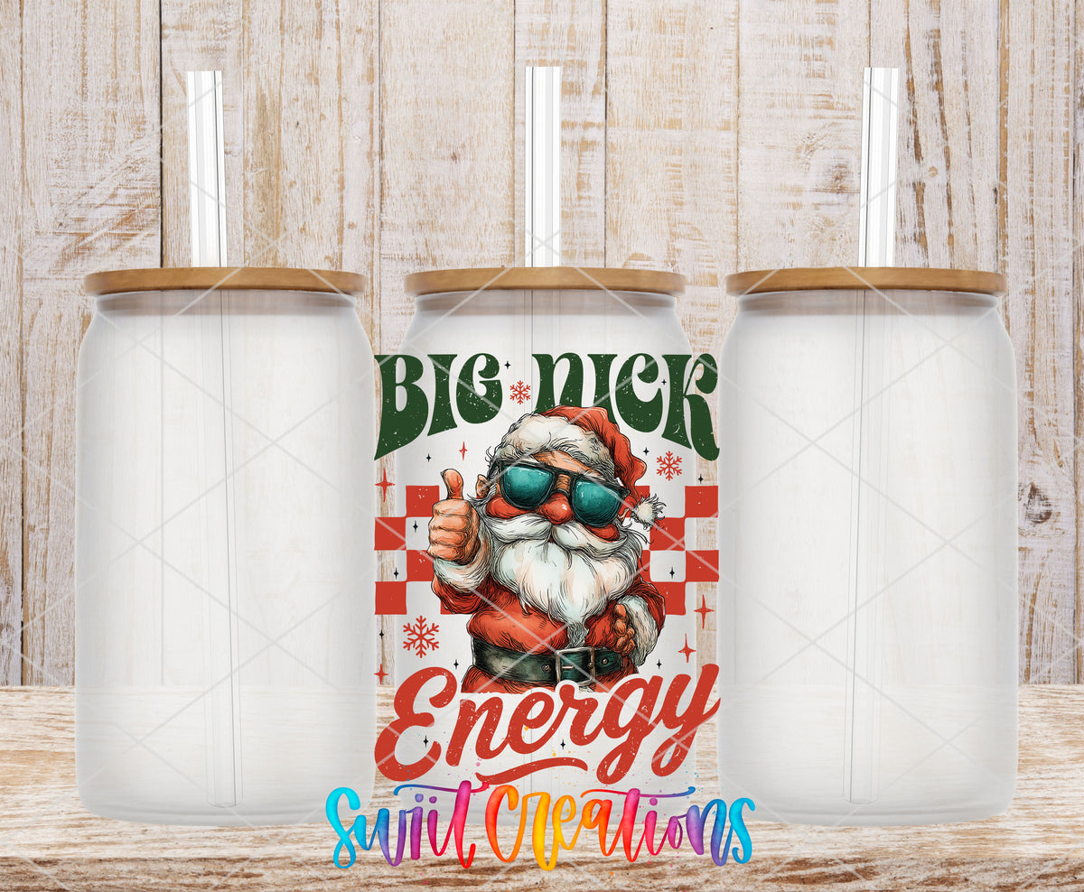 Big Nick Energy Santa UV DTF transfer on frosted glass cans with bamboo lids