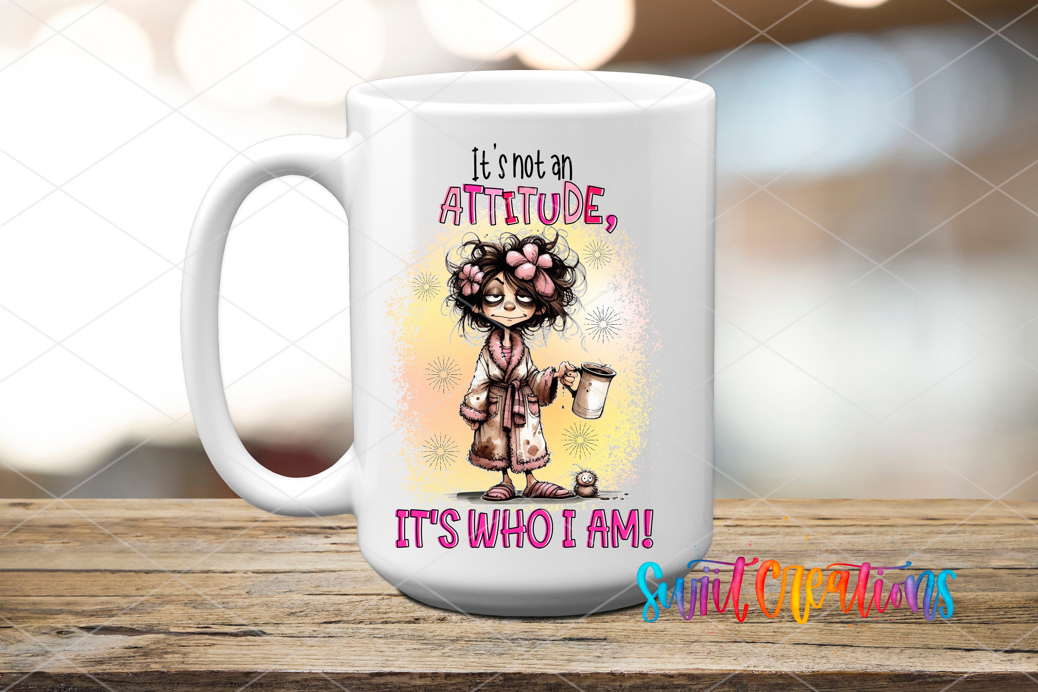 A white ceramic mug with a colorful illustration of a person wearing a bathrobe and holding a cup, along with the text "It's not an attitude, it's who I am!"