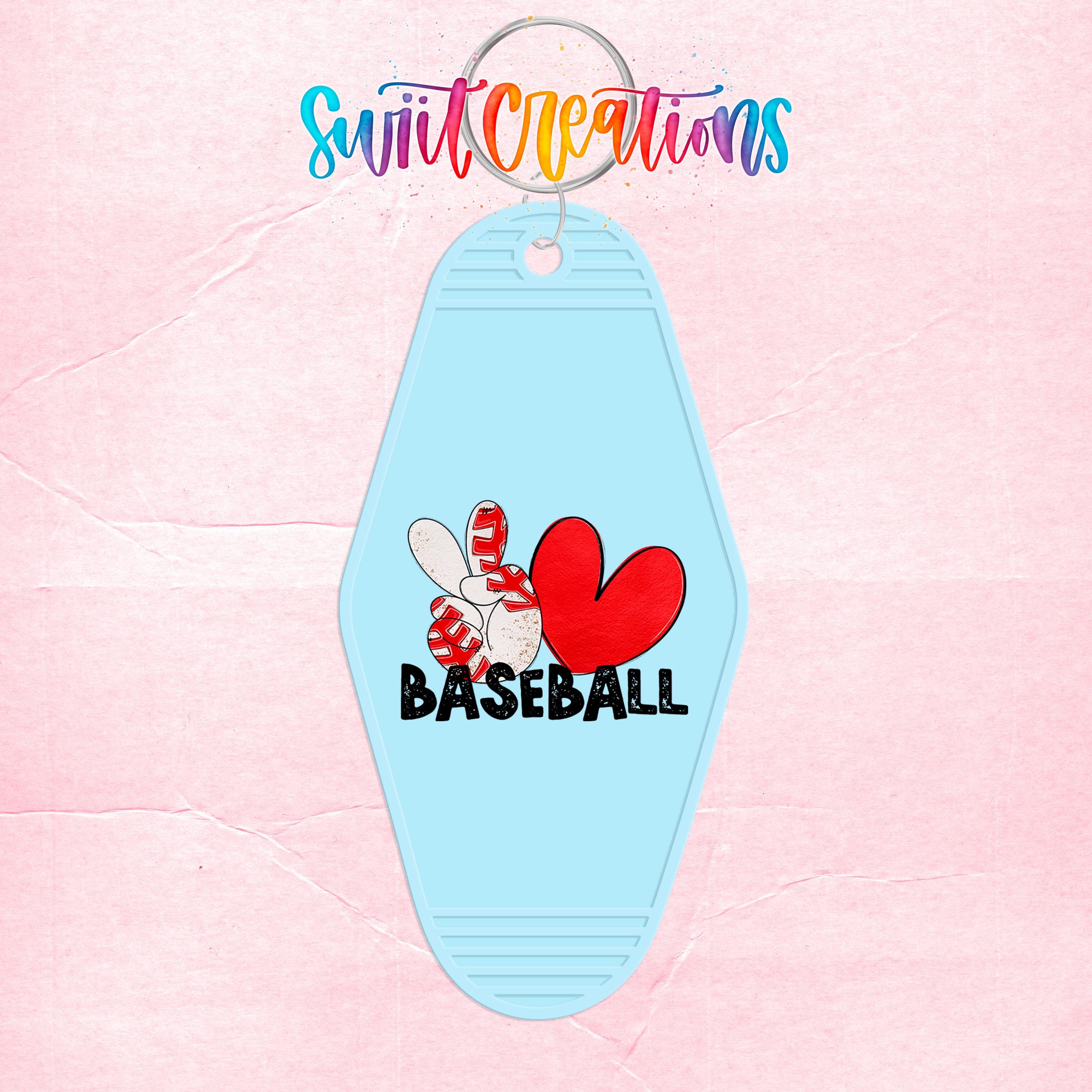 A keychain with a light blue color and a heart-shaped design featuring a baseball and the word "BASEBALL".