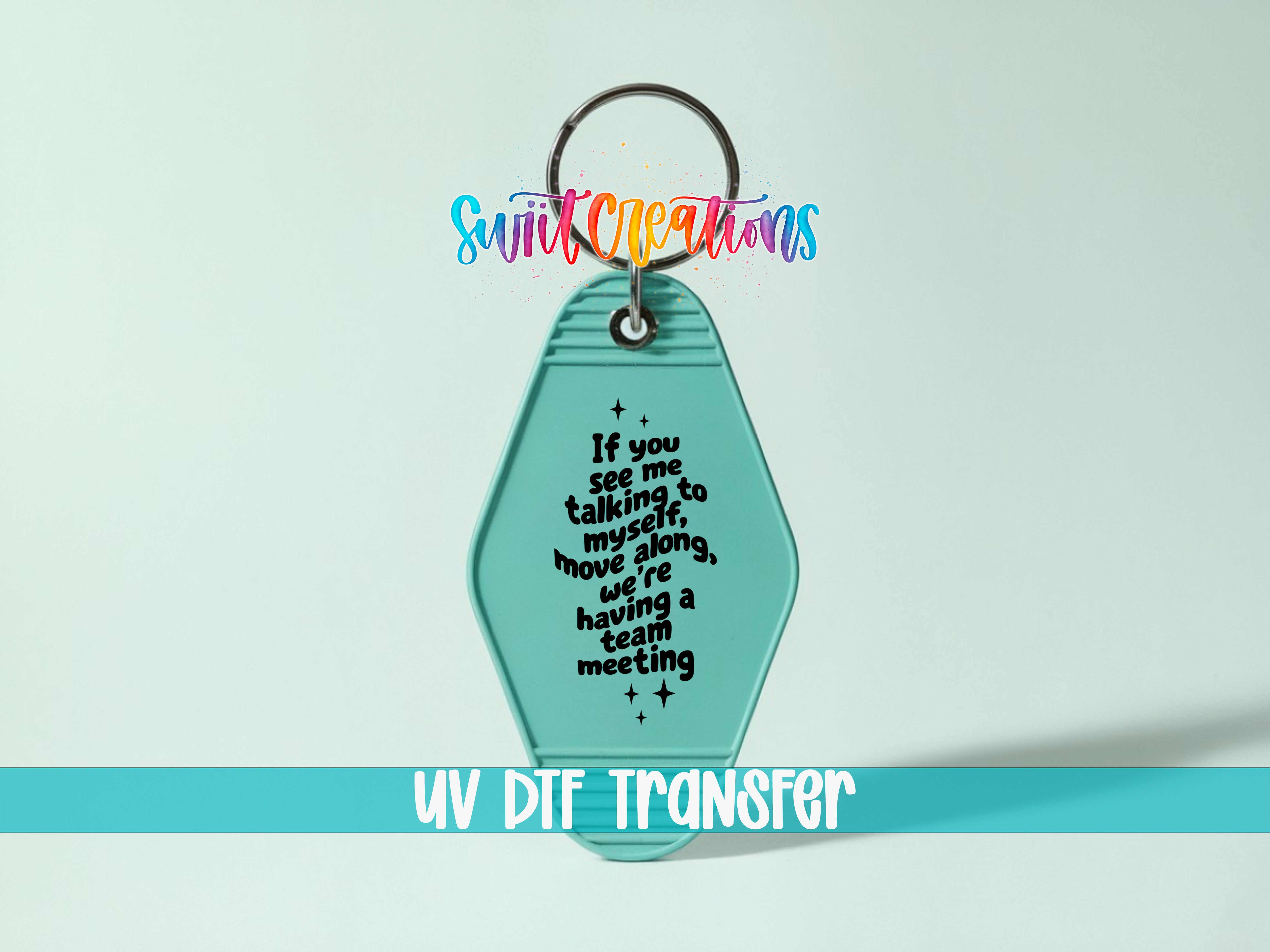 A keychain with a message printed on it, along with a UV DIF Transfer label below it.