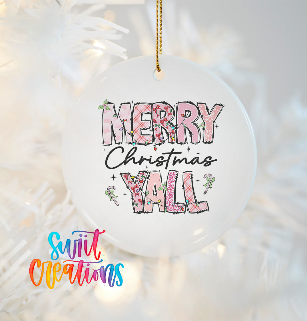 A white Christmas ornament with the text "MERRY CHRISTMAS YALL" printed on it.