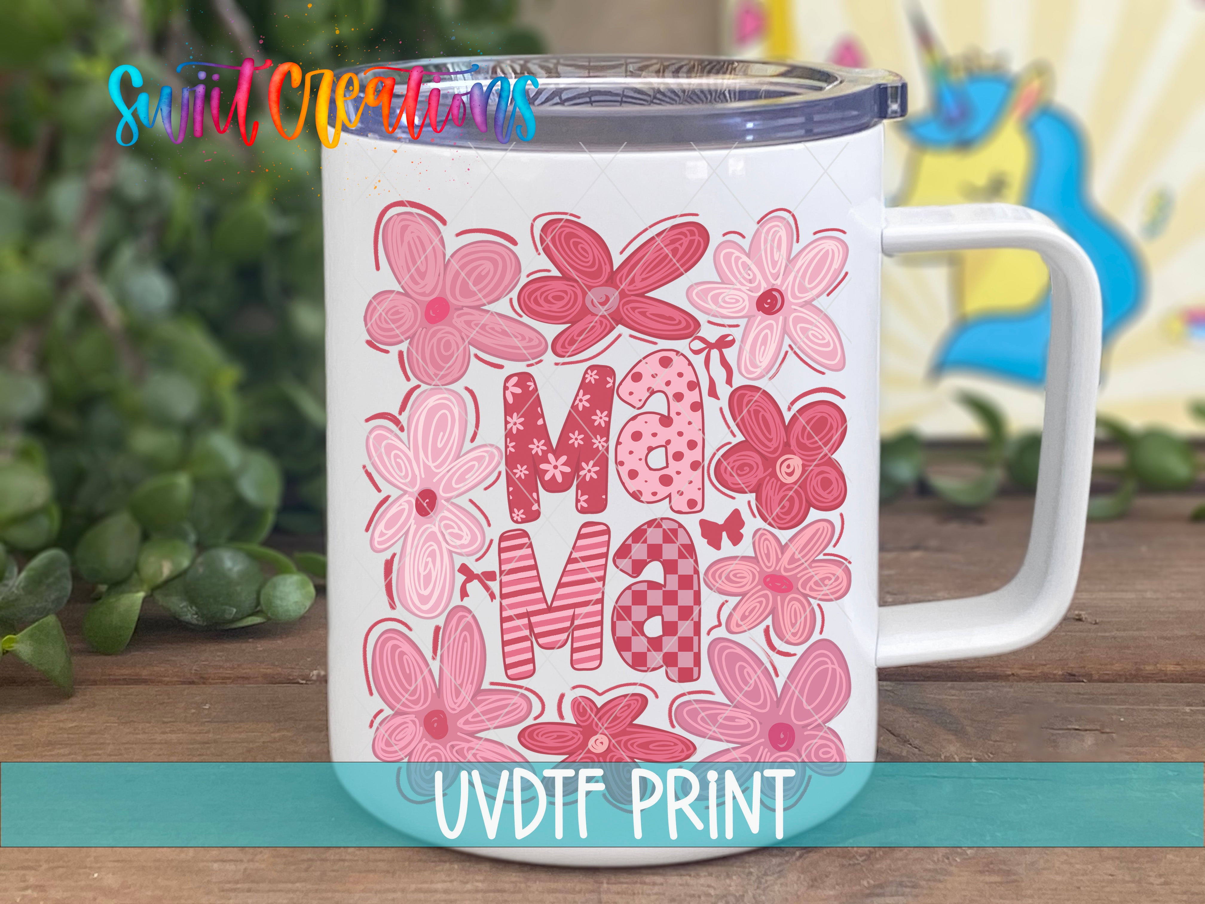 a white coffee mug with pink flowers on it