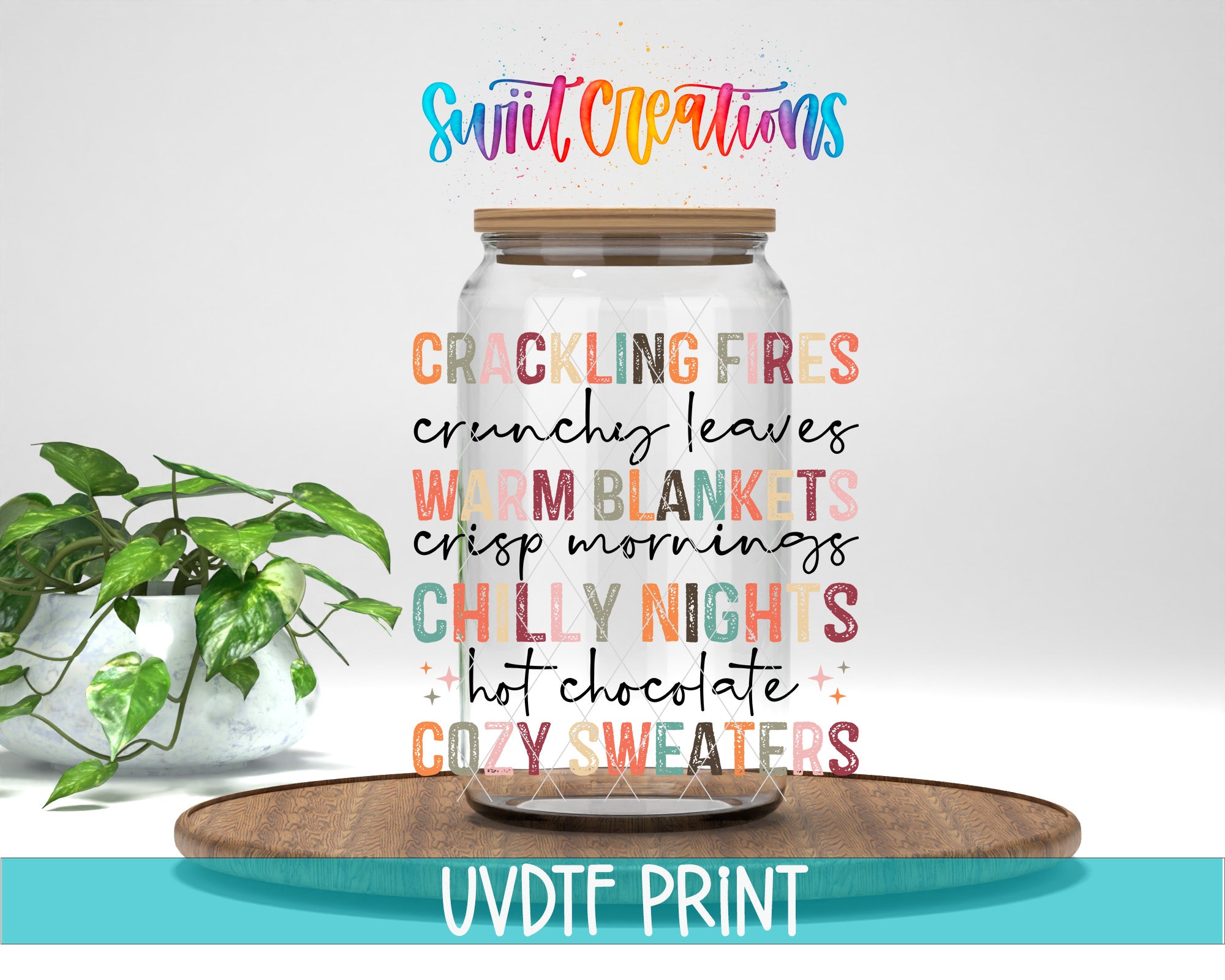 a glass jar with a wooden lid, surrounded by a potted plant and a wooden tray, with text that reads "Cracking Fries, crunchy leaves, warm blankets, crisp mornings, chilly nights, hot chocolate, cozy sweaters" and "UVDF PRINT" at the bottom.