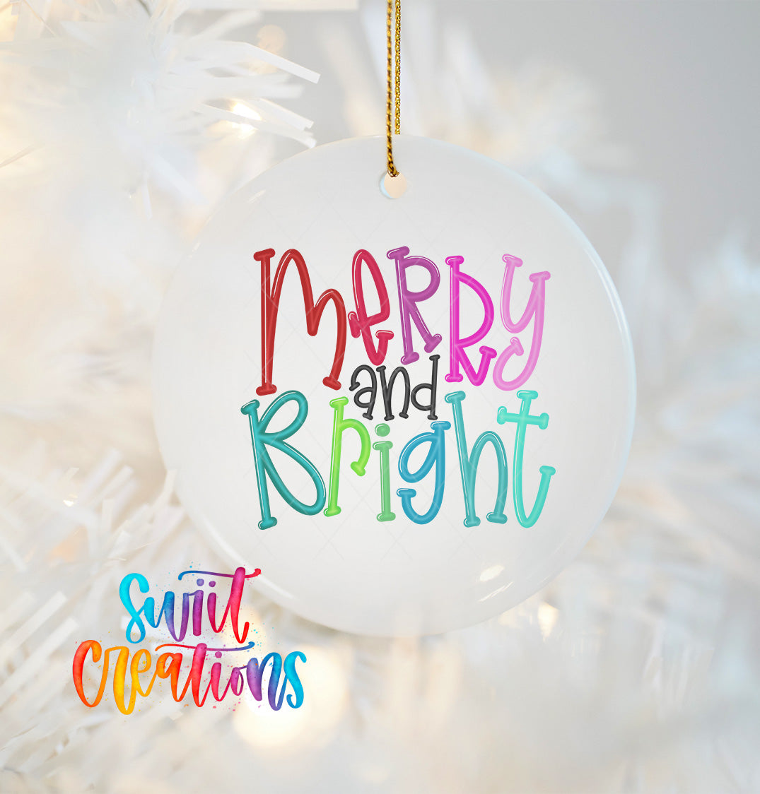 A white ceramic ornament with the text "Merry and Bright" written in a colorful, cursive font.