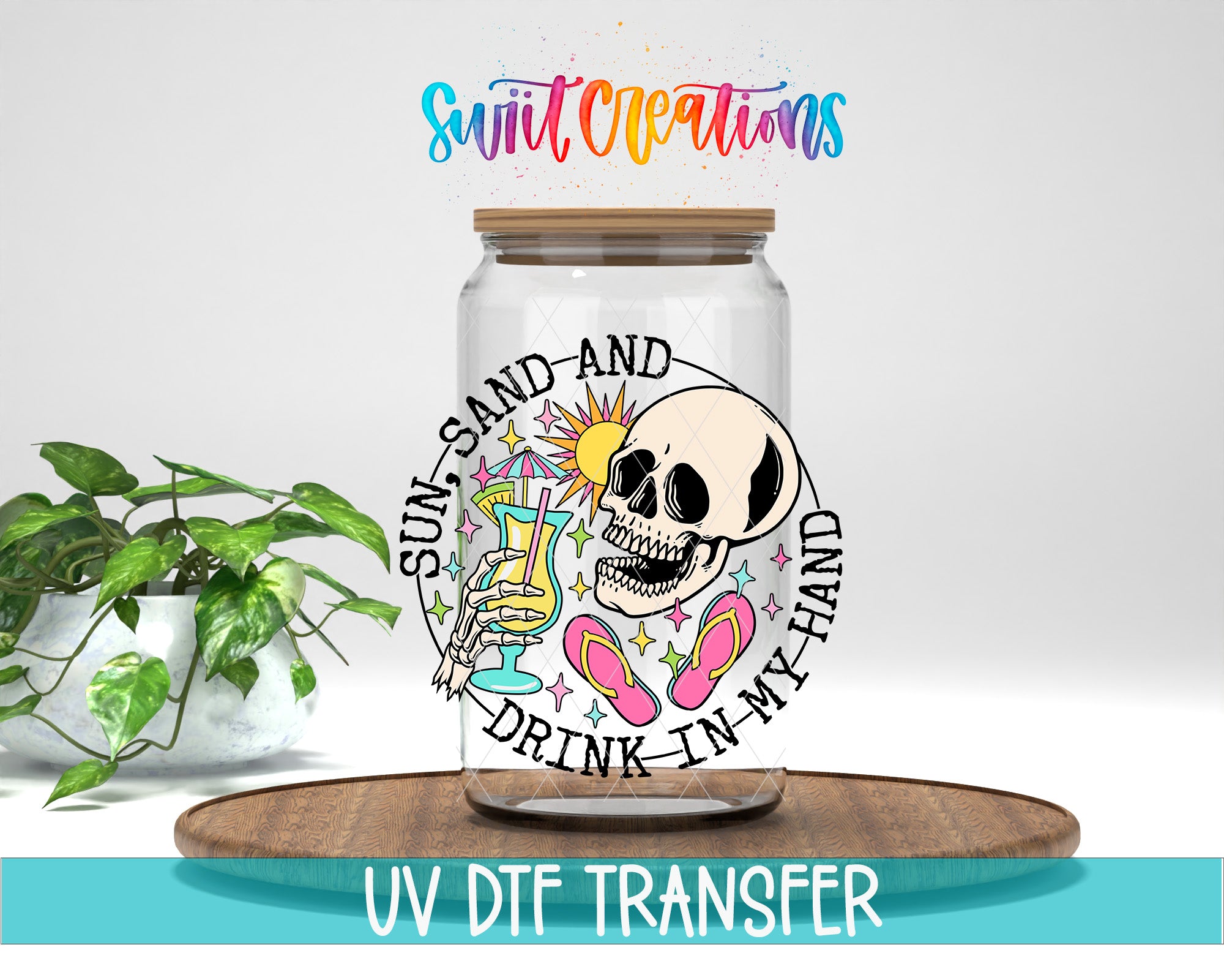 a glass jar with a skull and beach-themed design, along with the text "SUN-SAND-AND DRINK-IN MY HAND" and "UV DFT TRANSFER".