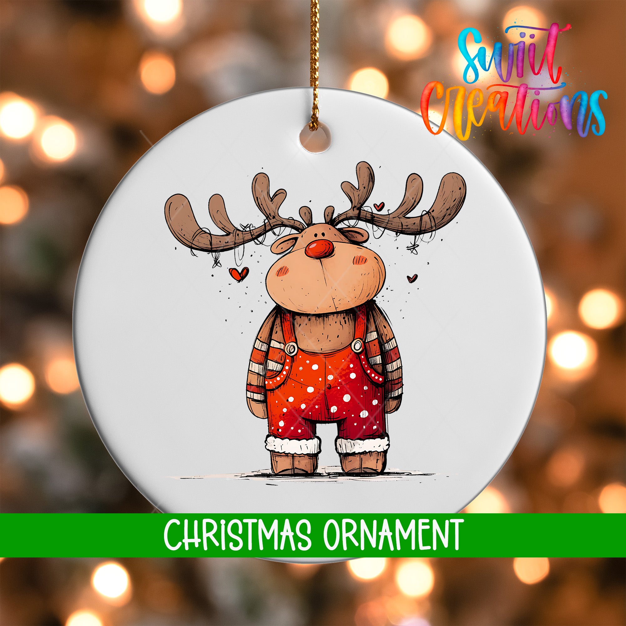 A white Christmas ornament featuring a cartoon reindeer wearing red overalls with white polka dots.