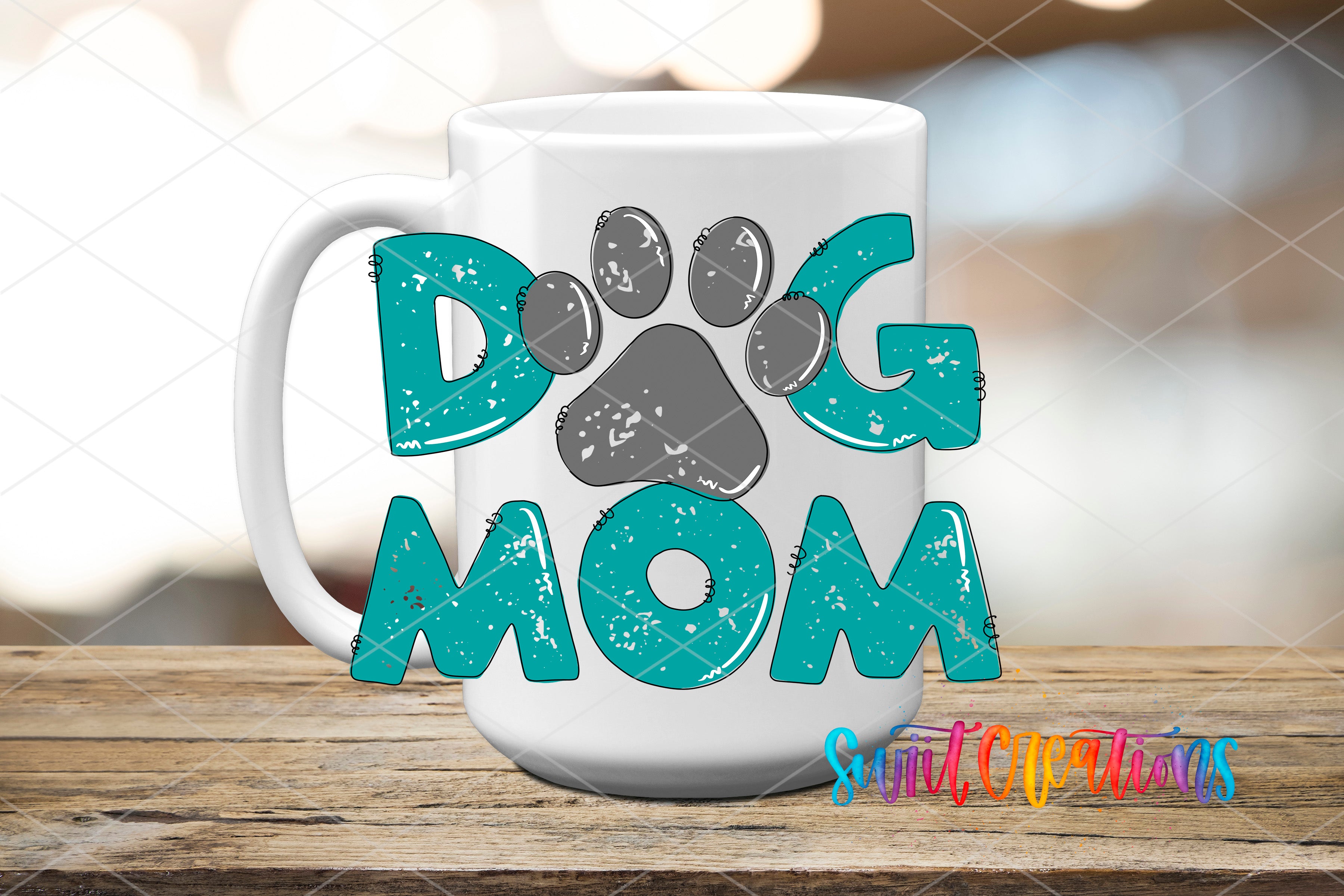 Swiit Creations UV DTF Dog Mom transfer applied to a white ceramic mug