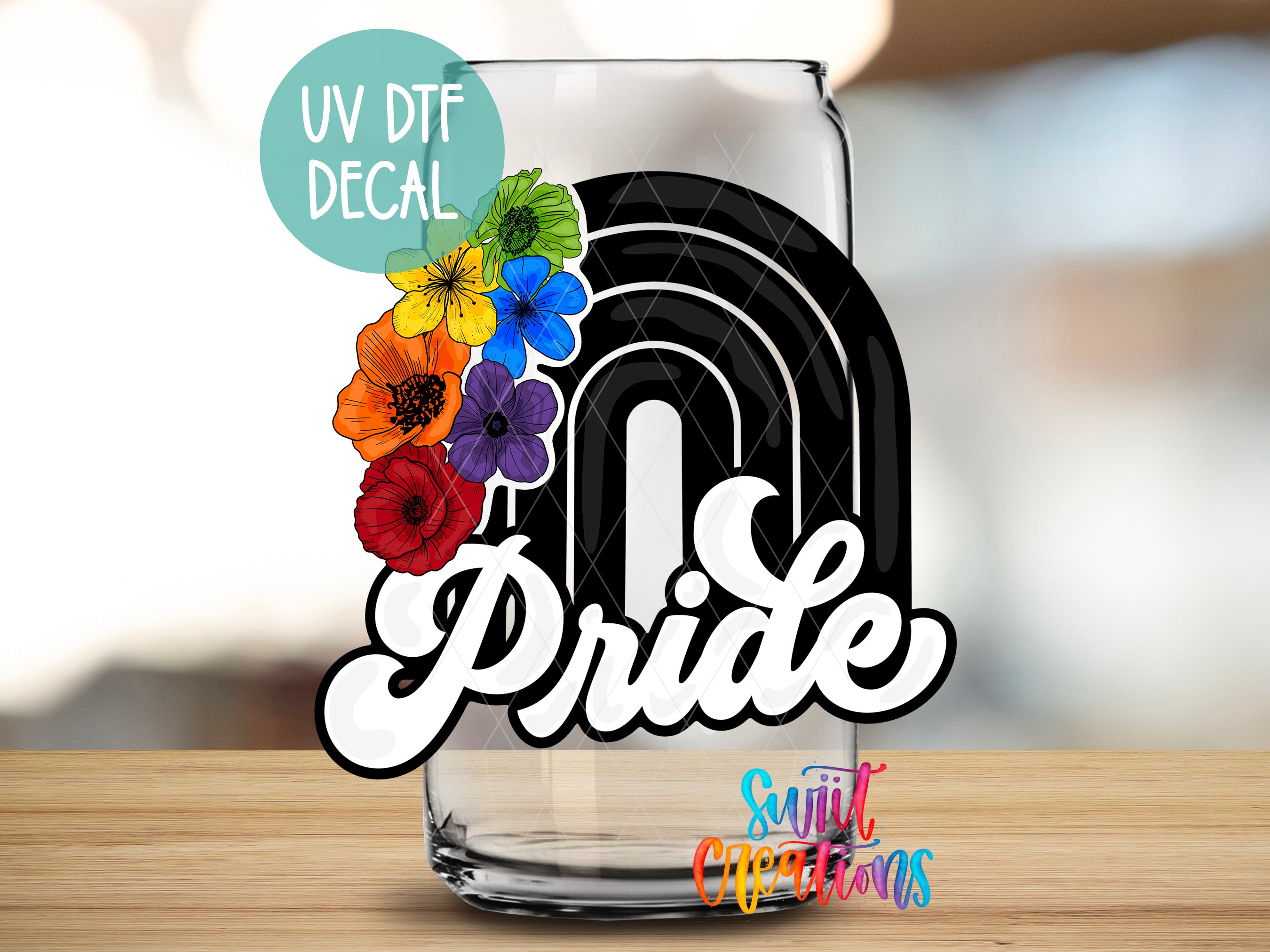 a glass with the word pride painted on it