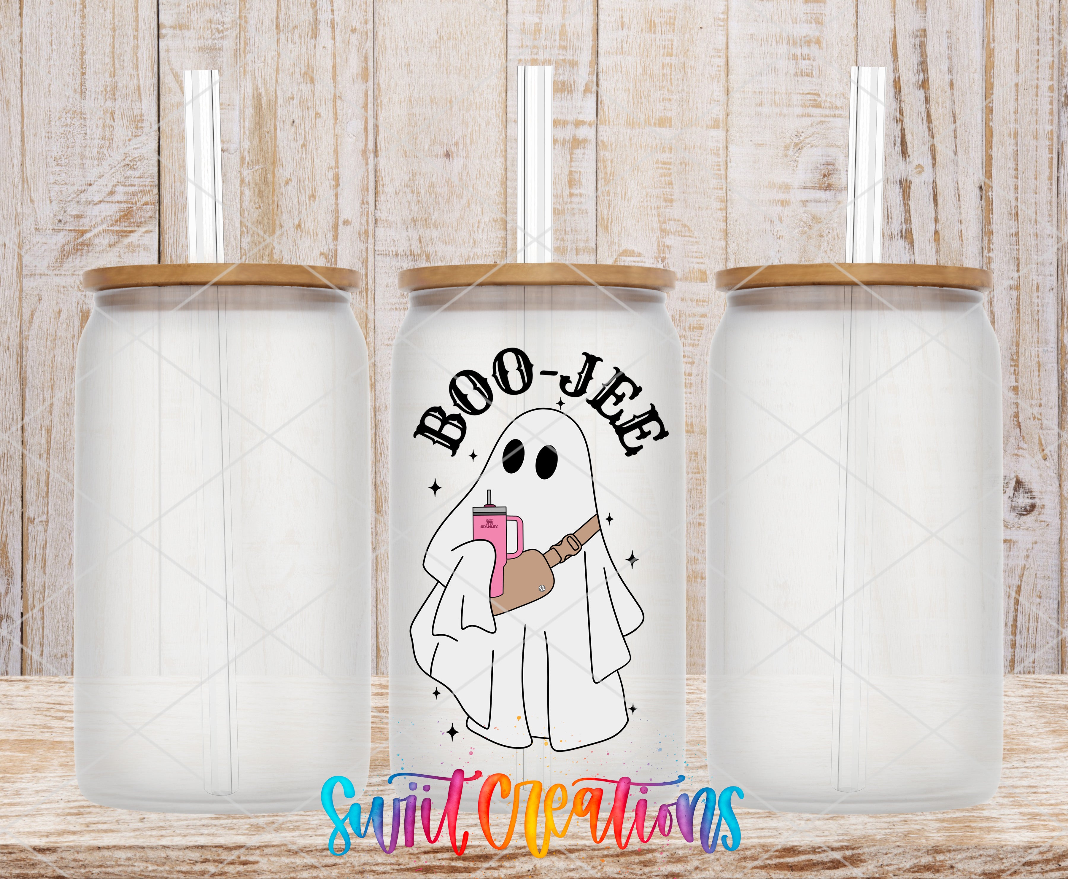 Swiit Creations UV DTF Boo-Jee transfer shown on a clear glass can set