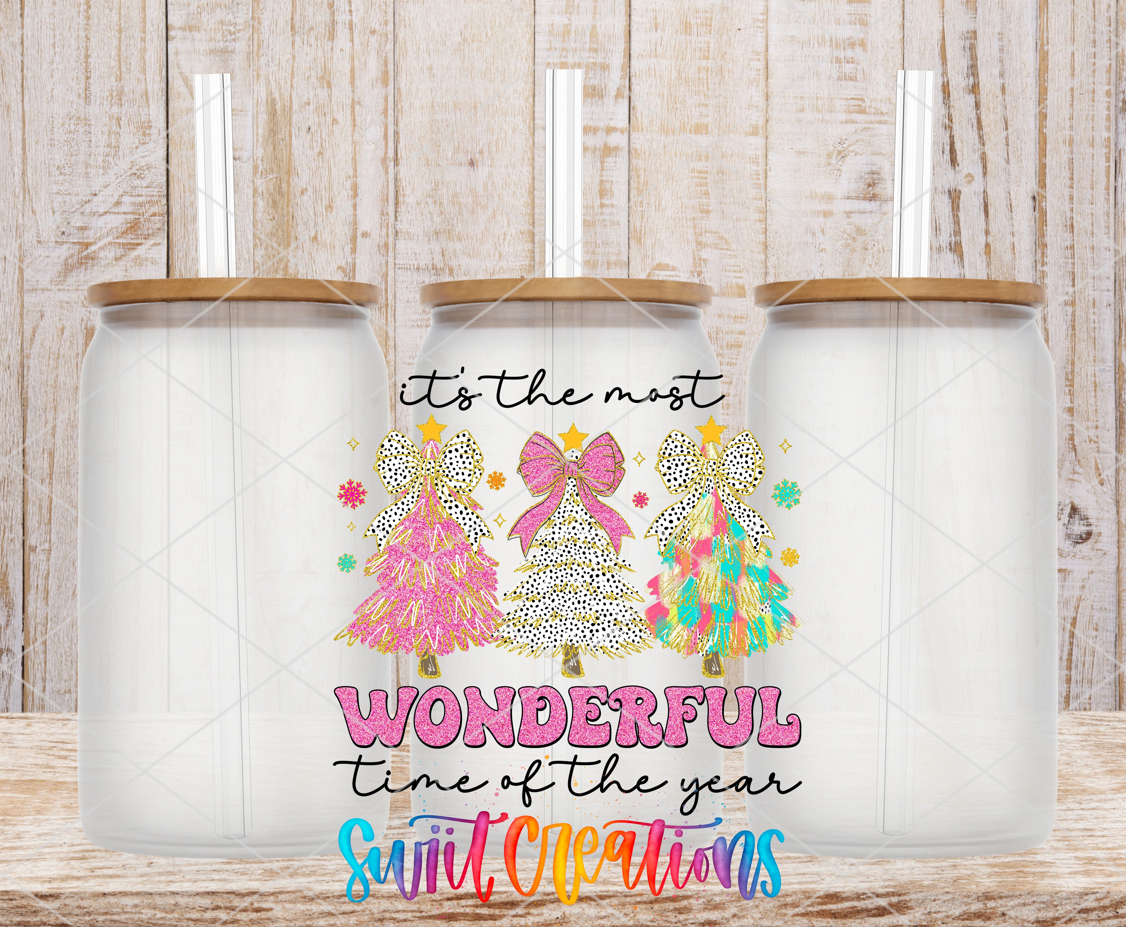 Swiit Creations UV DTF Tis the Season Christmas transfer shown on a clear glass can set