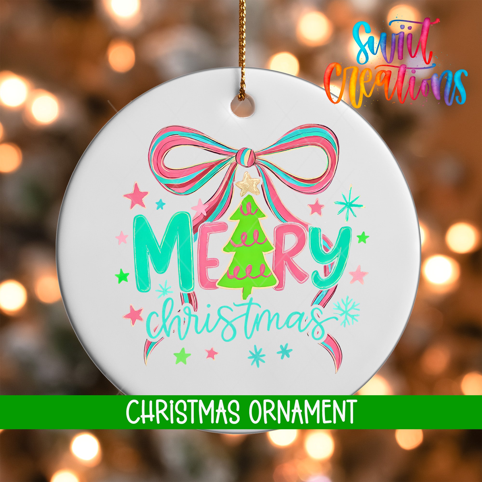 A white Christmas ornament with a bow and the text "Merry Christmas" in pink and green colors.
